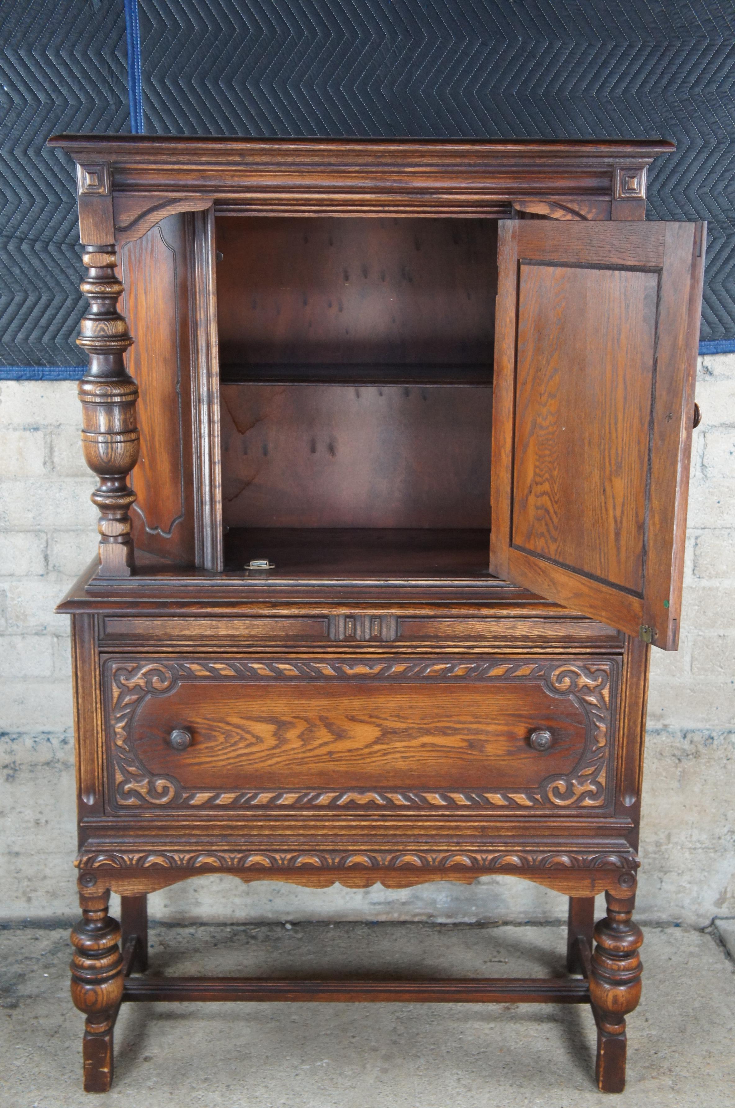 Vintage Bernhardt Jacobean Style Carved Oak Court Cupboard China Cabinet Hutch In Good Condition For Sale In Dayton, OH