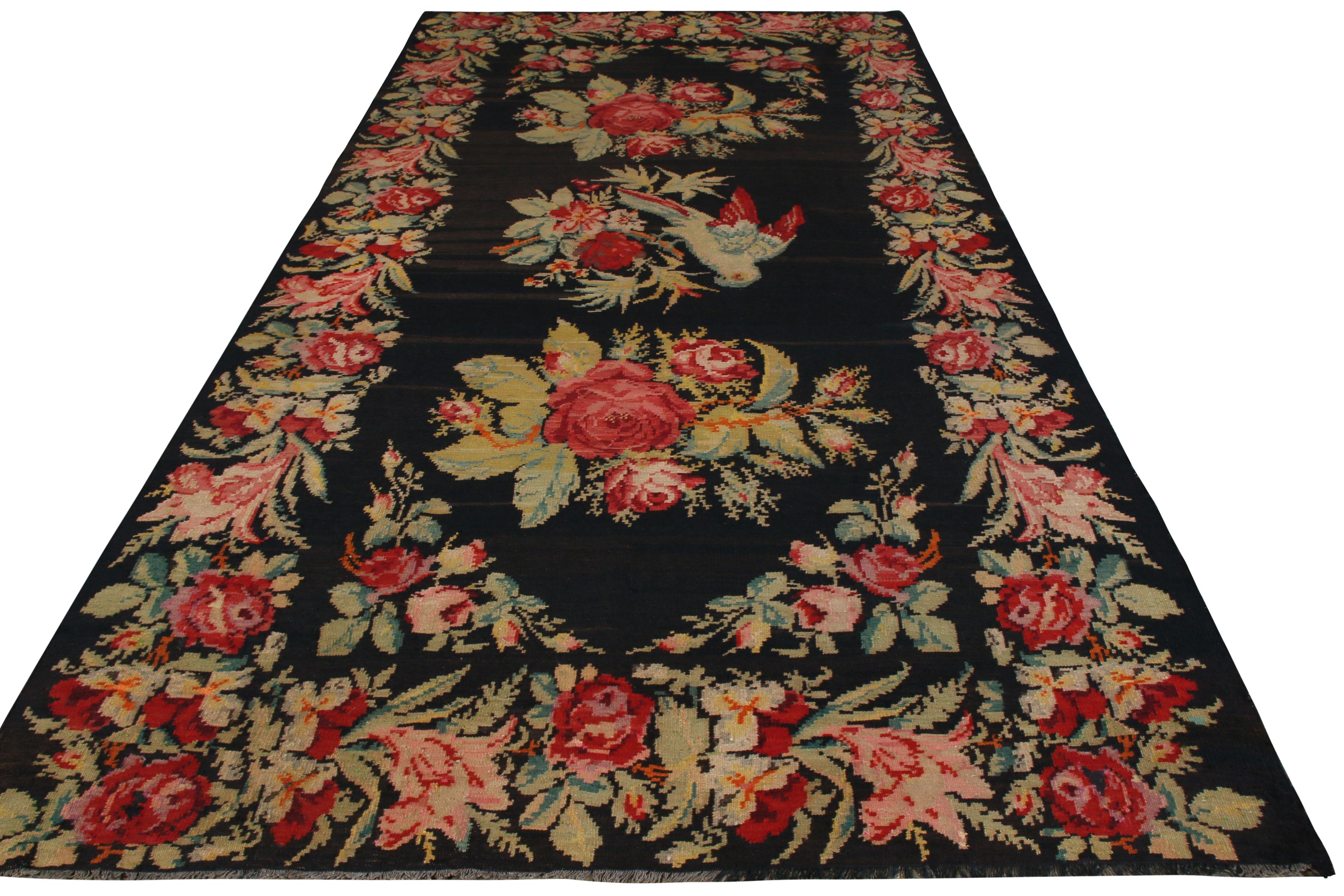 Originating circa 1950-1960 as a vintage Bessarabian flat-weave Kilim, the style of this piece is distinctly Romanian, a country famed as the origin of some of the most celebrated Bessarabian Kilim designs archetypal of the European Kilim style.