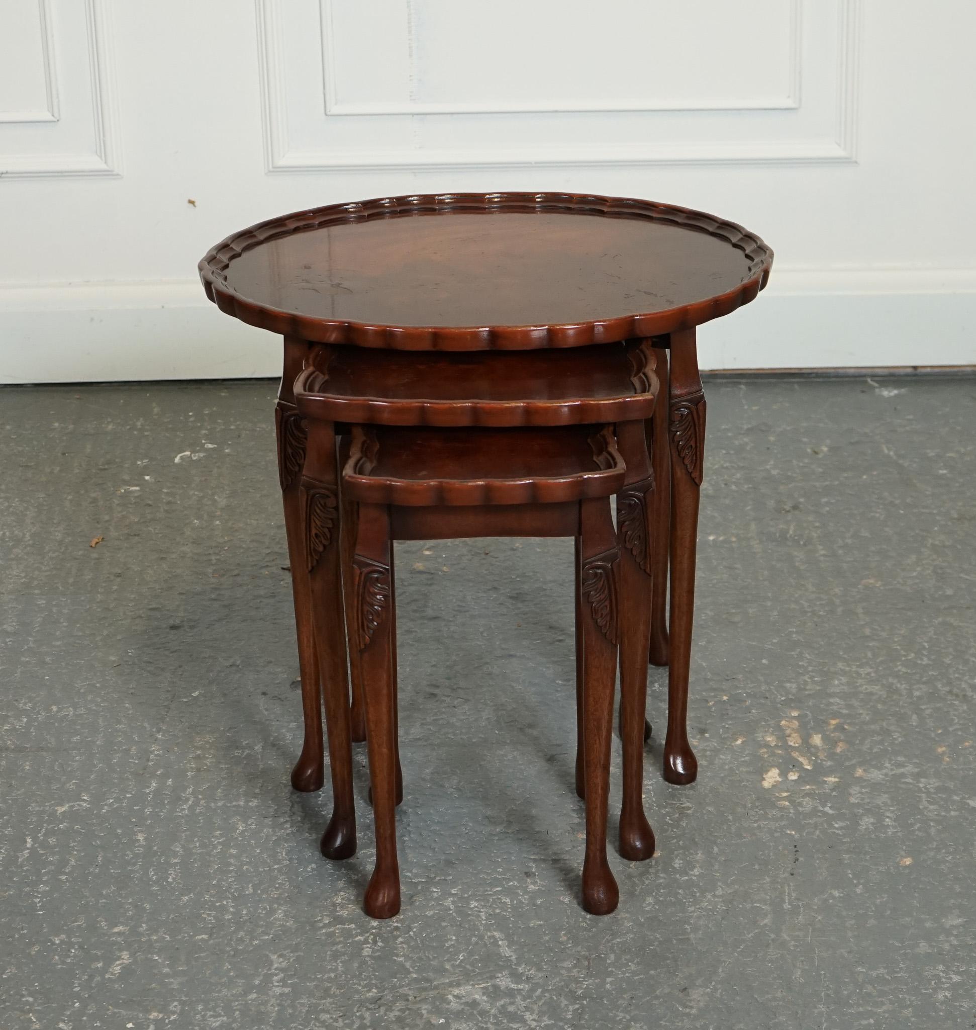 
We are delighted to offer for sale this Lovely Vintage Bevan Funnell Pie Crust Nest of Tables.

The vintage Bevan Funnel nest of tables is a set of three charming and unique tables with curved, pie crust tops. Made from high-quality wood, these