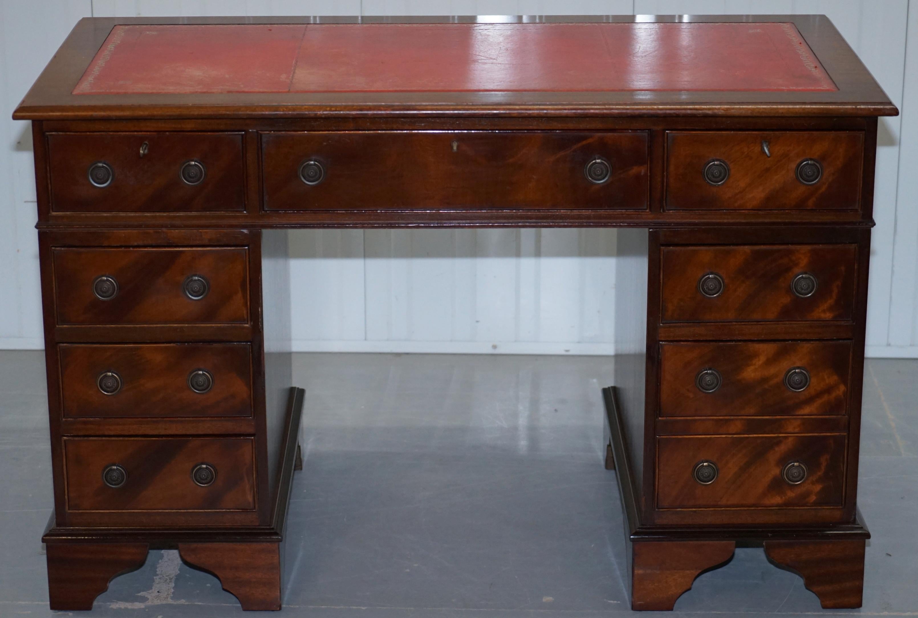 We are delighted to offer for sale this vintage Bevan Funnell twin pedestal partner desk finished in luxury flamed mahogany and with an oxblood leather top

A very good looking and well-made desk with a lovely timber patina, the leather top is