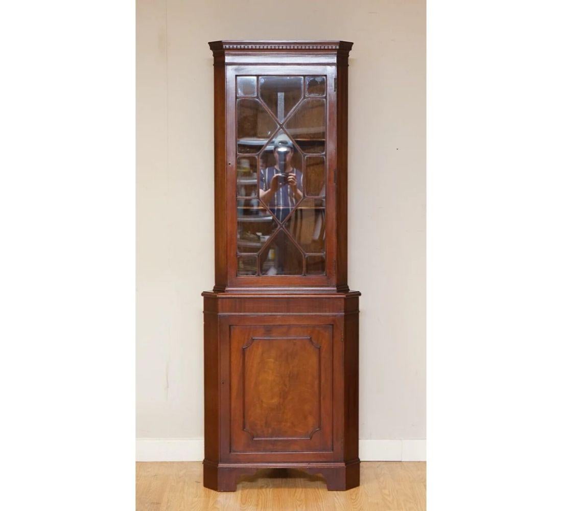 We are delighted to offer for sale this outstanding brown mahogany Astragal Glazed gorner cabinet.

It has a key to lock the doors, a very well-made piece. We have lightly restored this by giving it a hand clean all over, hand waxed and hand