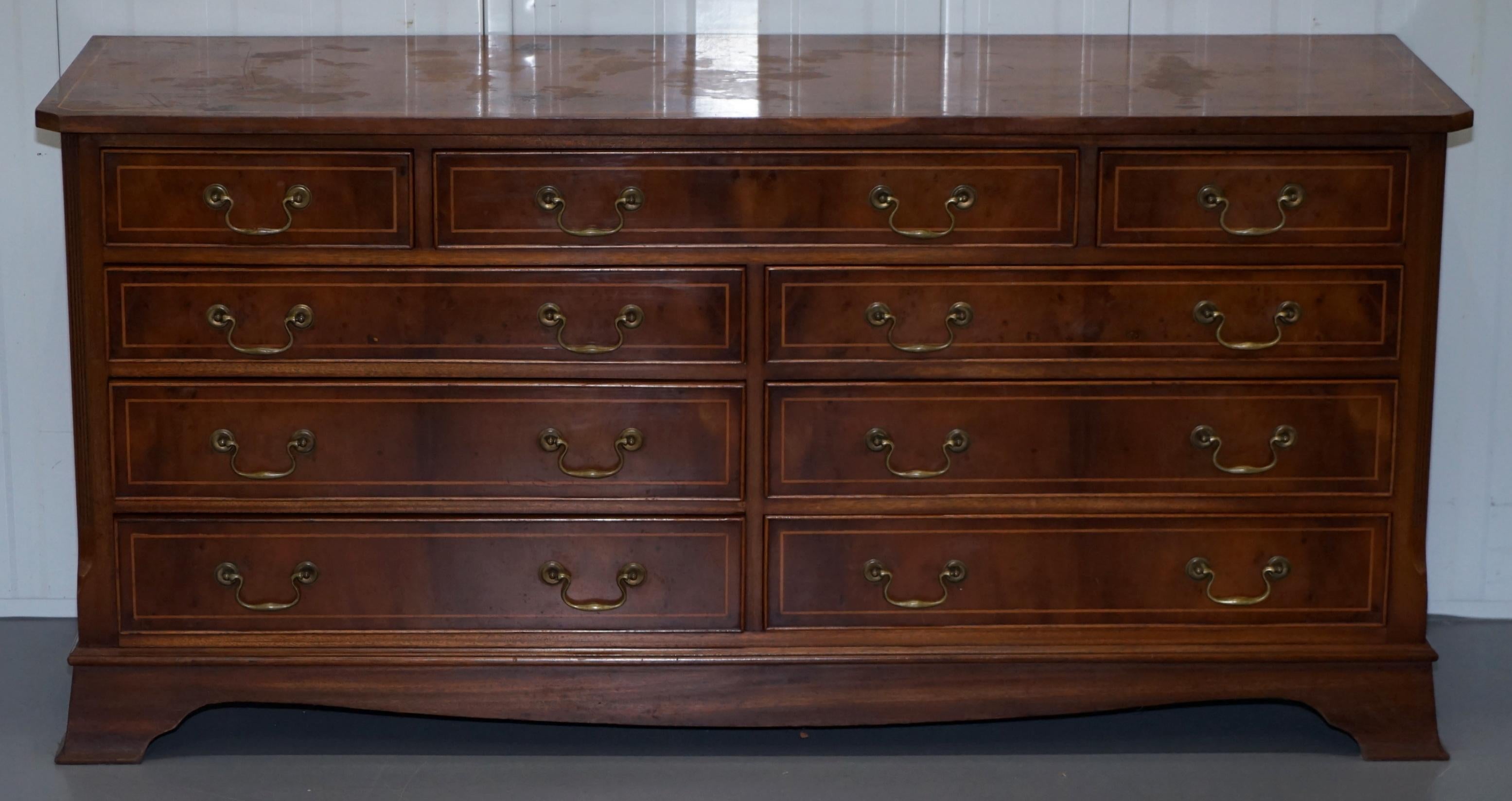 We are delighted to offer for sale this nice vintage Bevan Funnell hand made in England sideboard sized bank or chest of drawers in Burr Yew wood

A good looking, functional and well made piece of furniture, the drawers all open and close as they