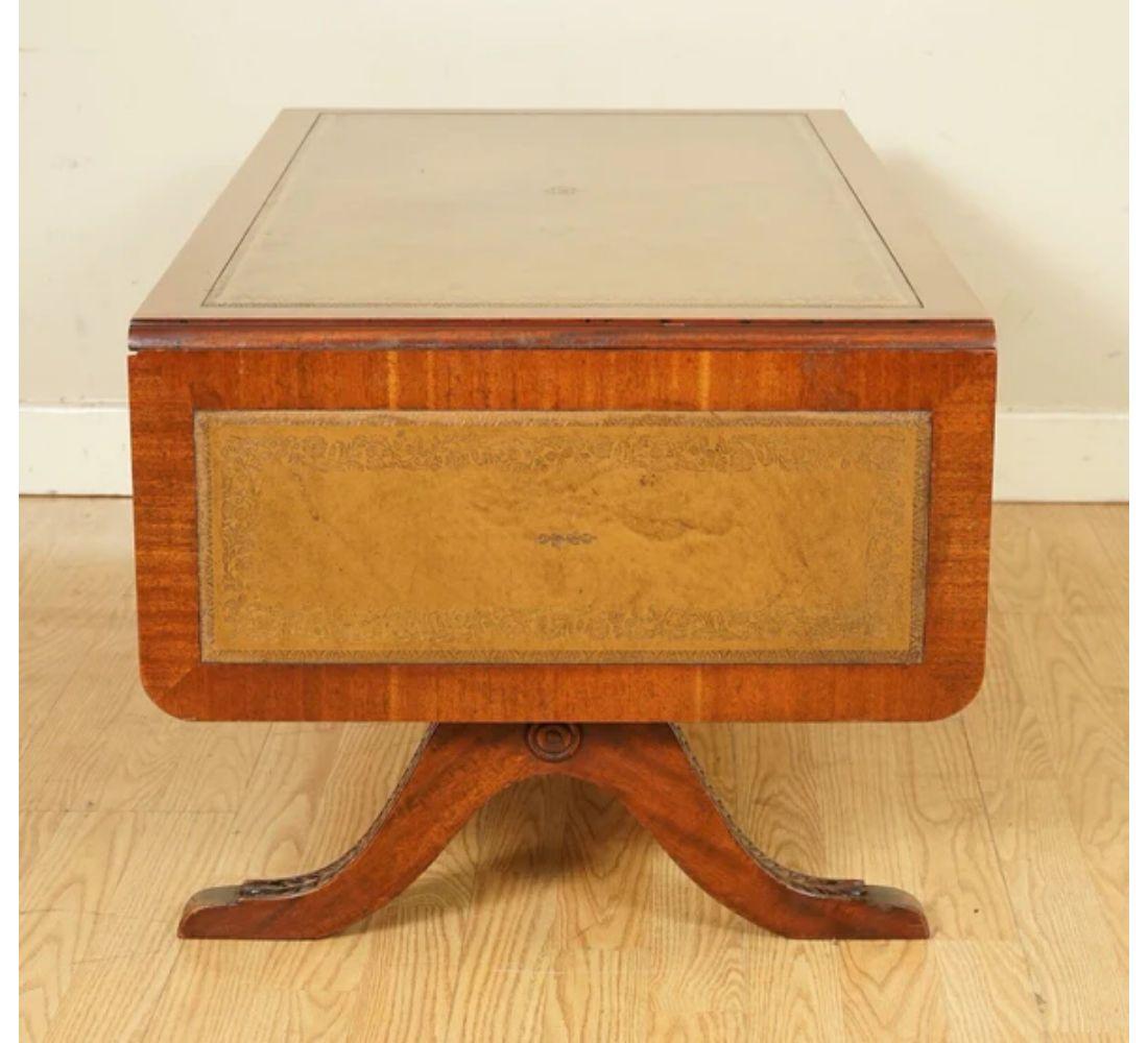 Vintage Bevan Funnell Extending Coffee Table with Leather Top Carved Legs In Good Condition For Sale In Pulborough, GB