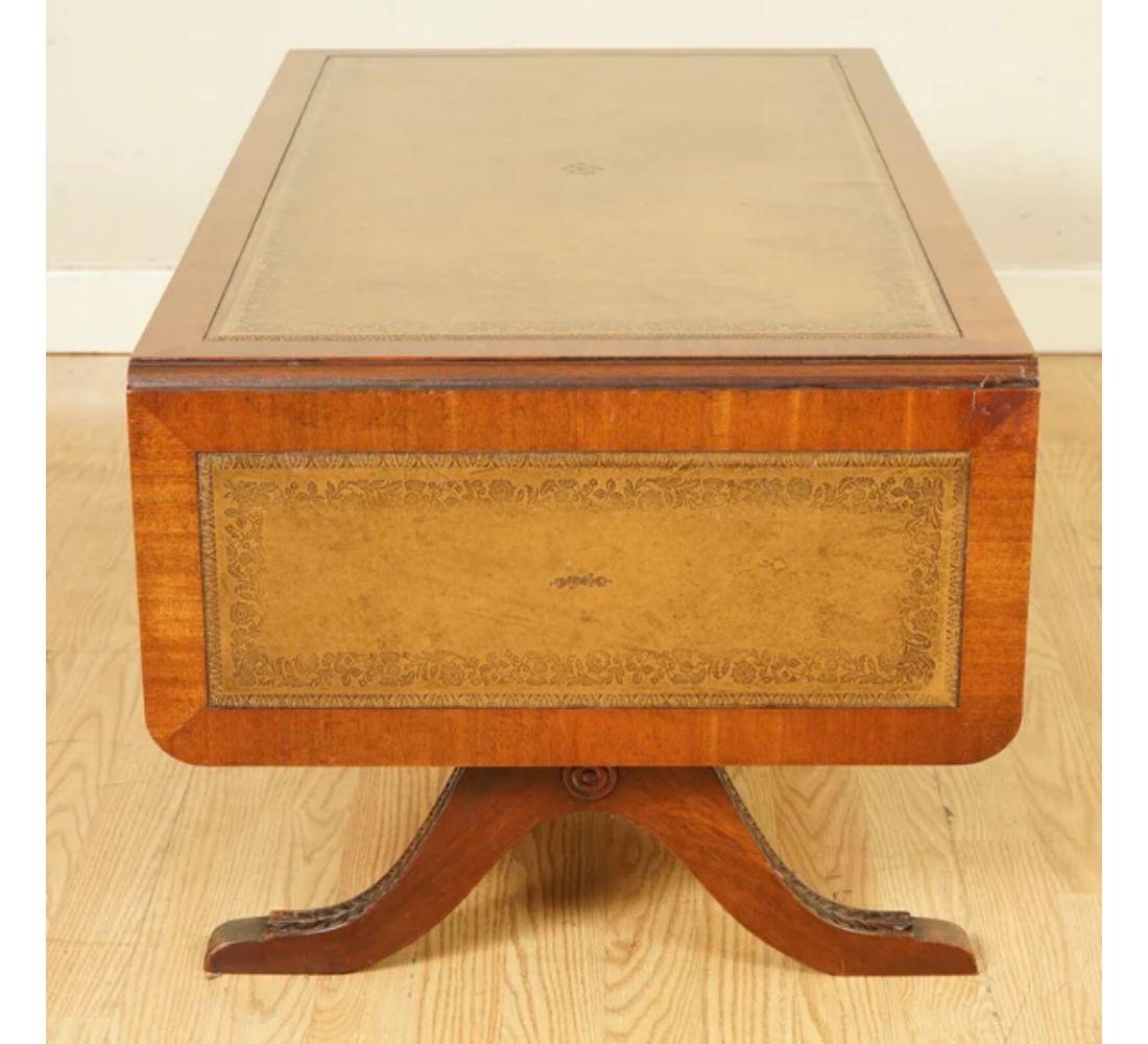 20th Century Vintage Bevan Funnell Extending Coffee Table with Leather Top Carved Legs For Sale