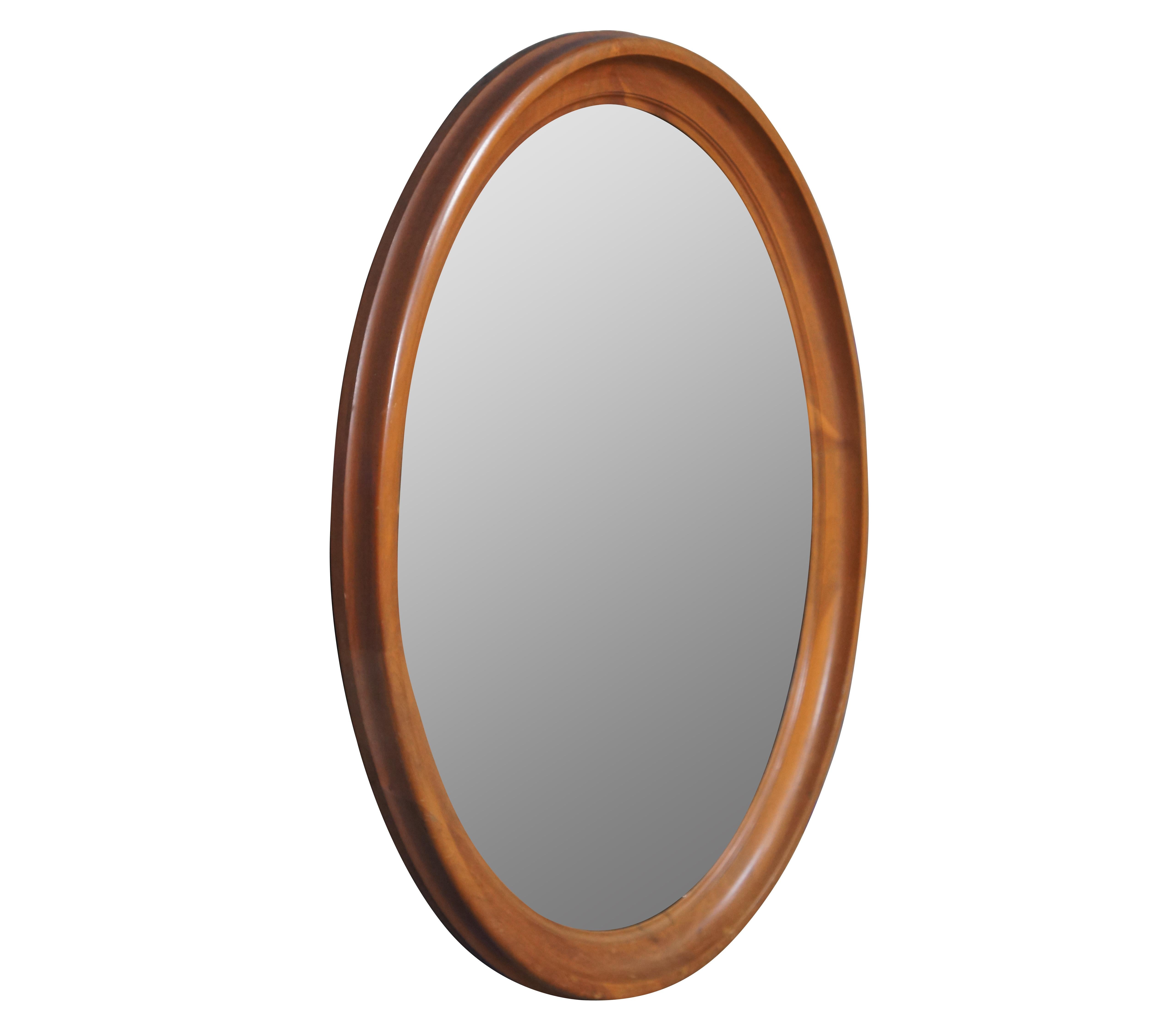 Vintage, oval, beveled frame, mahogany wall mirror.

Dimensions

25.5” x 1.75” x 31.25” / Sans Frame – 21.5” x 27.5” (Width x Depth x Height).