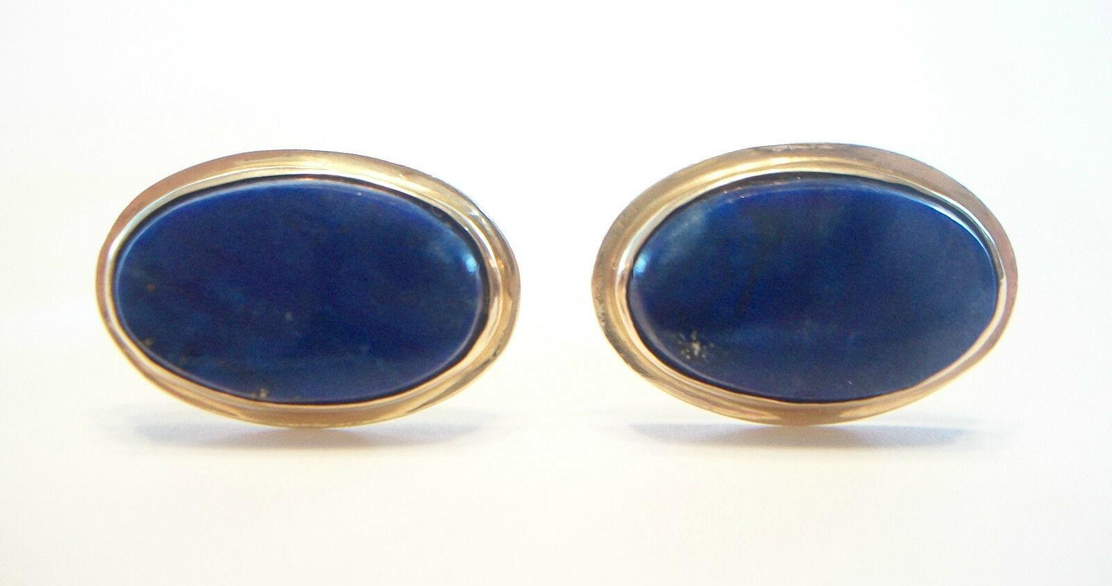 Vintage Lapis Lazuli & 14K yellow gold cufflinks - bezel set gemstones - bench made/hand made - unsigned - each toggle stamped 14K - late 20th century.

Excellent vintage condition - all original - no loss - no damage - no repairs - fine surface