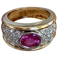 Vintage Bezel Set Pink Sapphire and Brilliant Cut Diamond 14 Karat Gold Ring