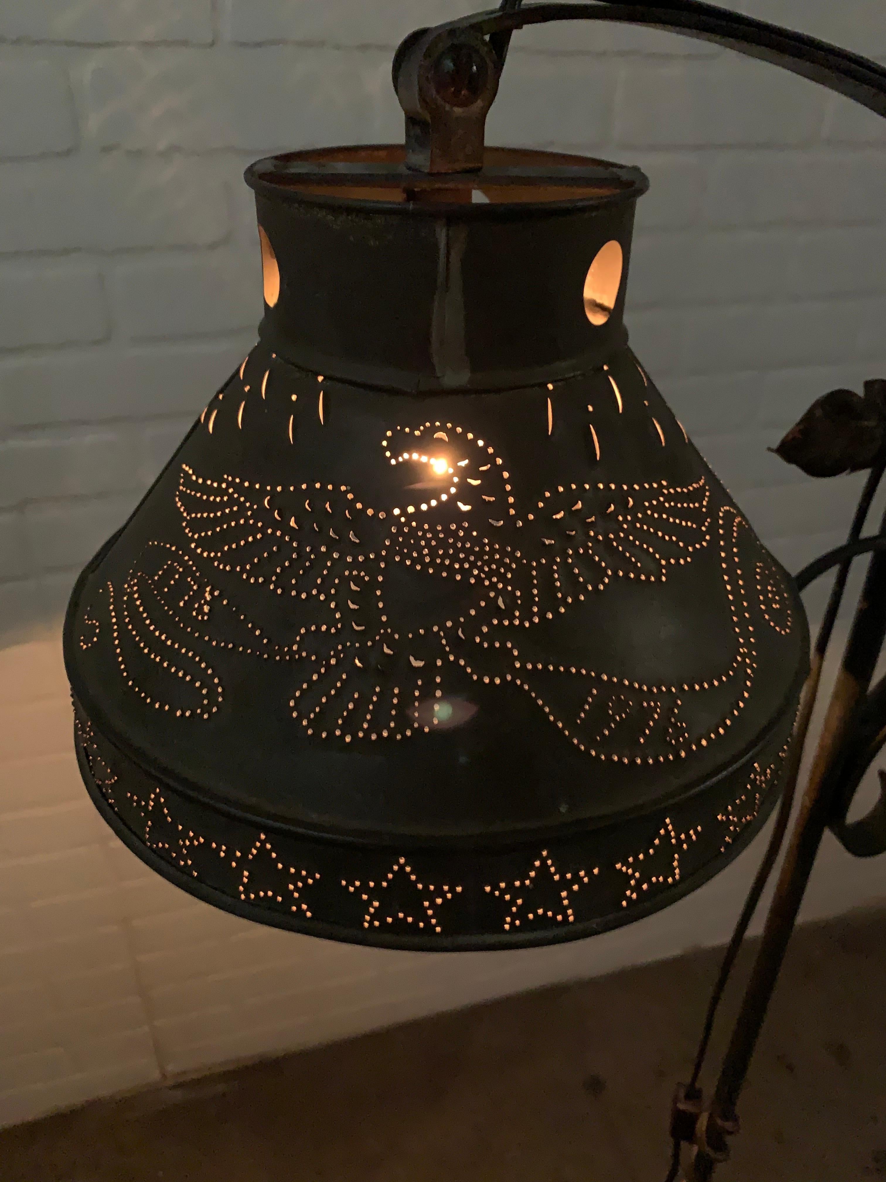 Forged iron bridge lamp with images of Americas Bald Eagle and George Washington punched in the tin shade to celebrate 200 years of freedom 1776-1976.