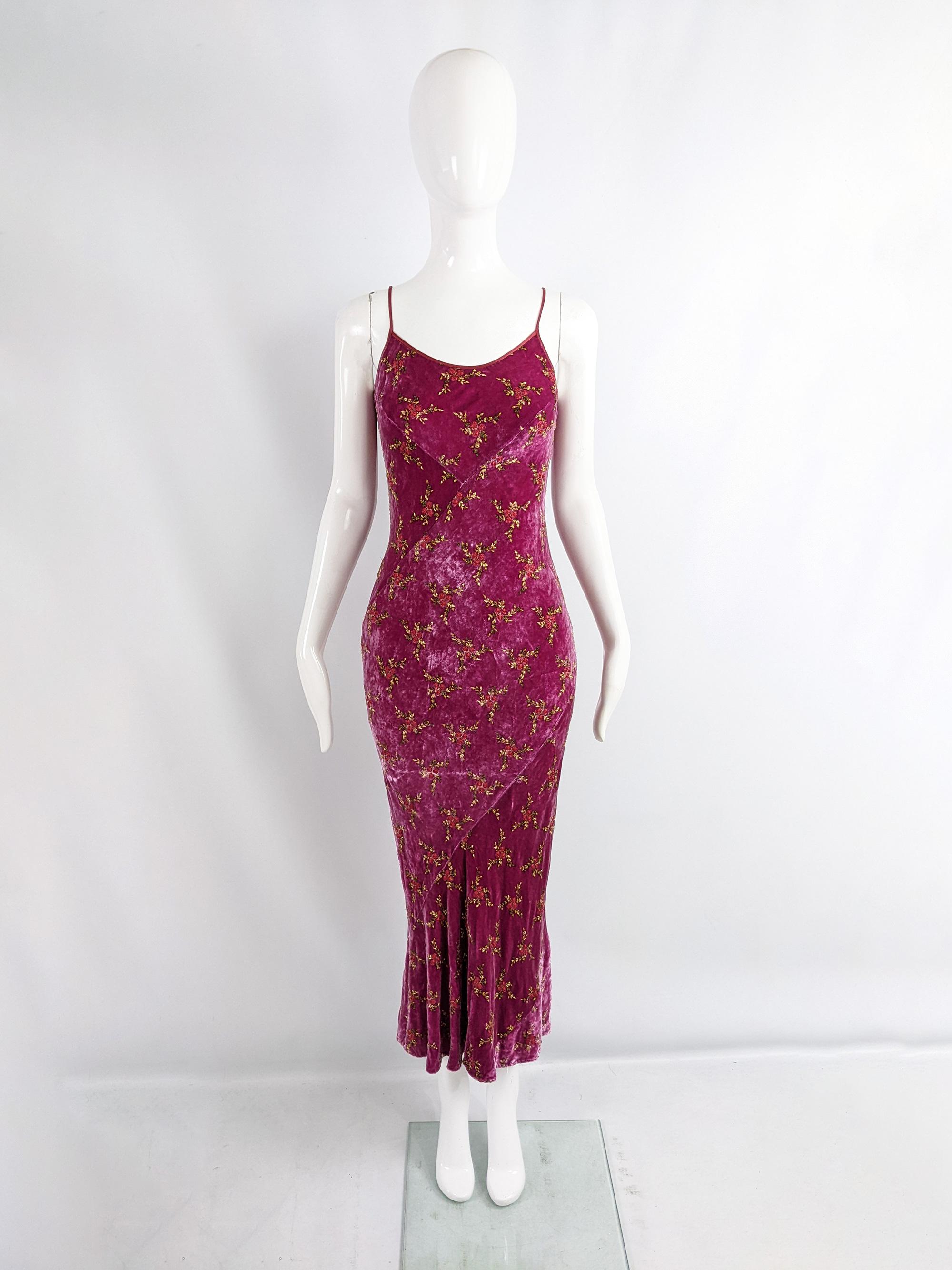 An incredible vintage womens maxi dress from the 90s by luxury British fashion designer, Edina Ronay. In a bias cut silk blend velvet with pure silk floral embroidery throughout. It has sexy satin trim to the neckline and a low back.

Size: Marked