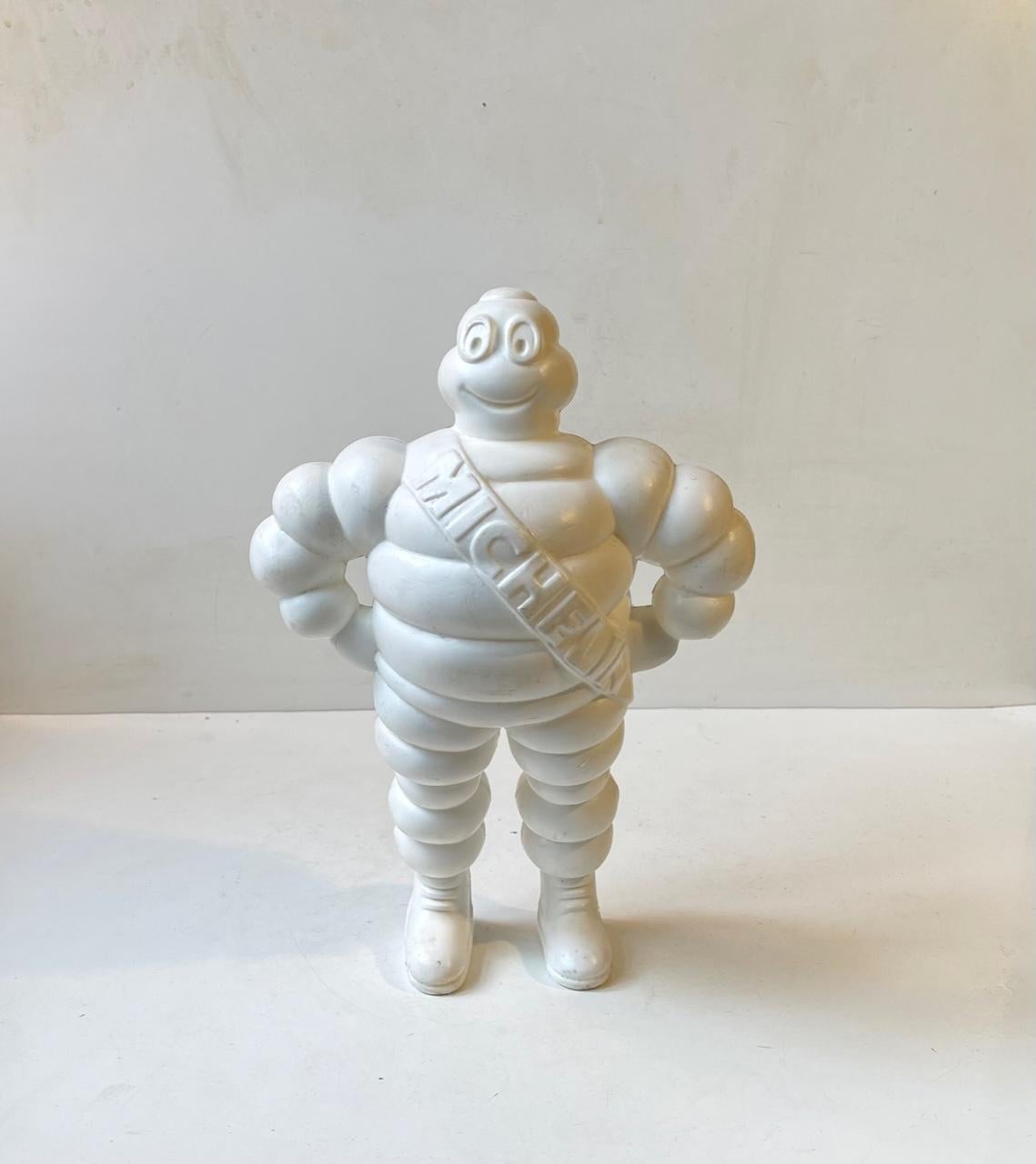 Standing original Bibemdum the Michelin mans initial name dating from the early 1980s. Made by Michelin in France for sign, truck or display purposes. Stamped to its feet: Made in France, Michelin C 1887. Measurements: H: 32 cm, W: 22 cm, Dept: 11