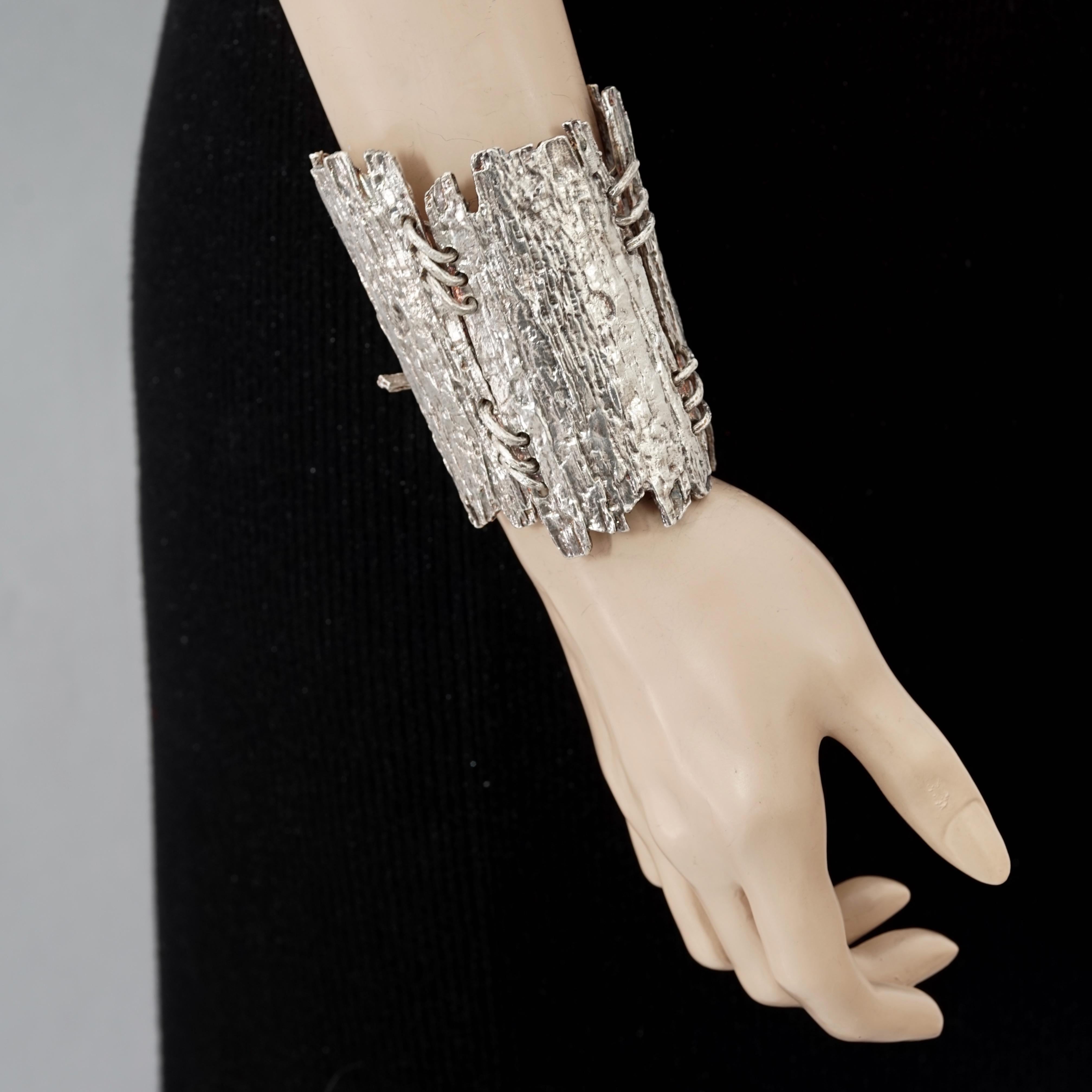 Vintage BICHE de BERE Jagged Textured Wide Statement Silver Cuff Bracelet

Measurements:
Height: 3.54 inches (9 cm)
Length: 6.29 inches (16 cm)

Features:
- 100% authentic BICHE DE BERE.
- Wide, jagged, textured, modernist articulated cuff