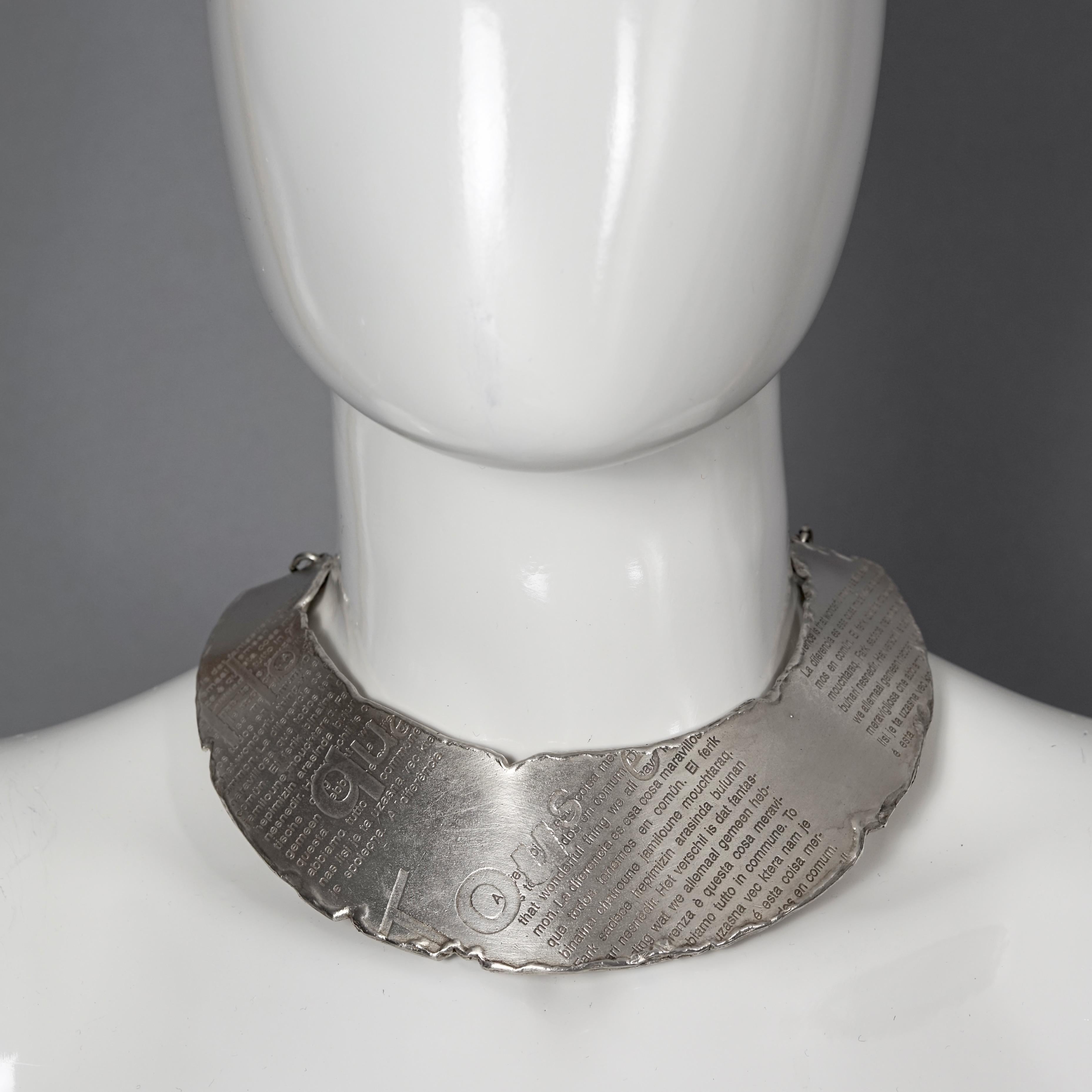 Vintage BICHE DE BERE Modernist Multilingual Statement Wide Choker Necklace
Limited edition. This is the 49th out of 147 pieces.

Measurements:
Height: 1.77 inches (4.5 cm)
Wearable Length: 14.17 inches (36 cm) max including the chain

Features:
-