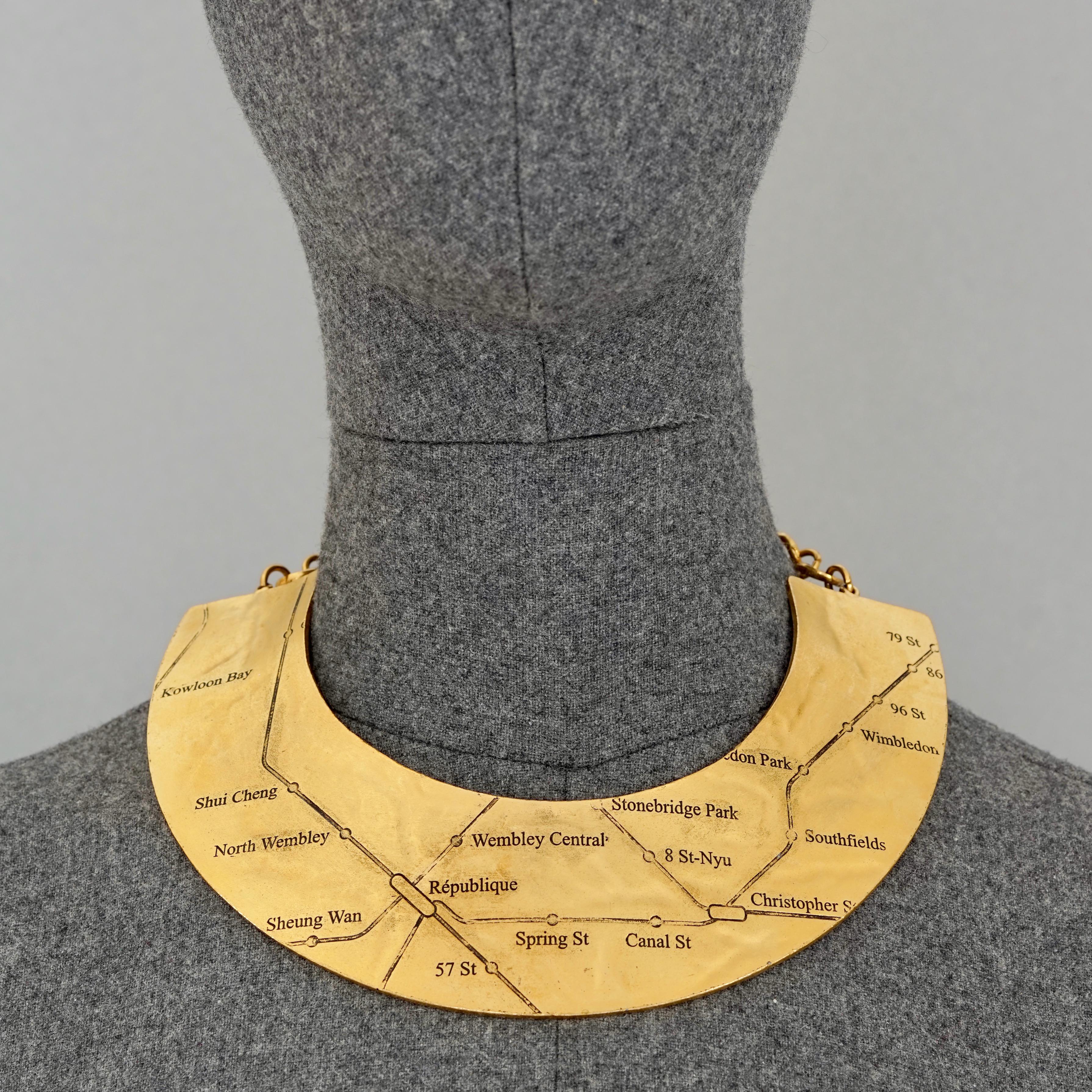 Vintage BICHE DE BERE Modernist Underground Map Novelty Wide Choker Necklace

Measurements:
Height: 1.97 inches (5 cm)
Wearable Length: 12.66 inches (32.16 cm) max including the chain

Limited edition. This is the 26th out of 489