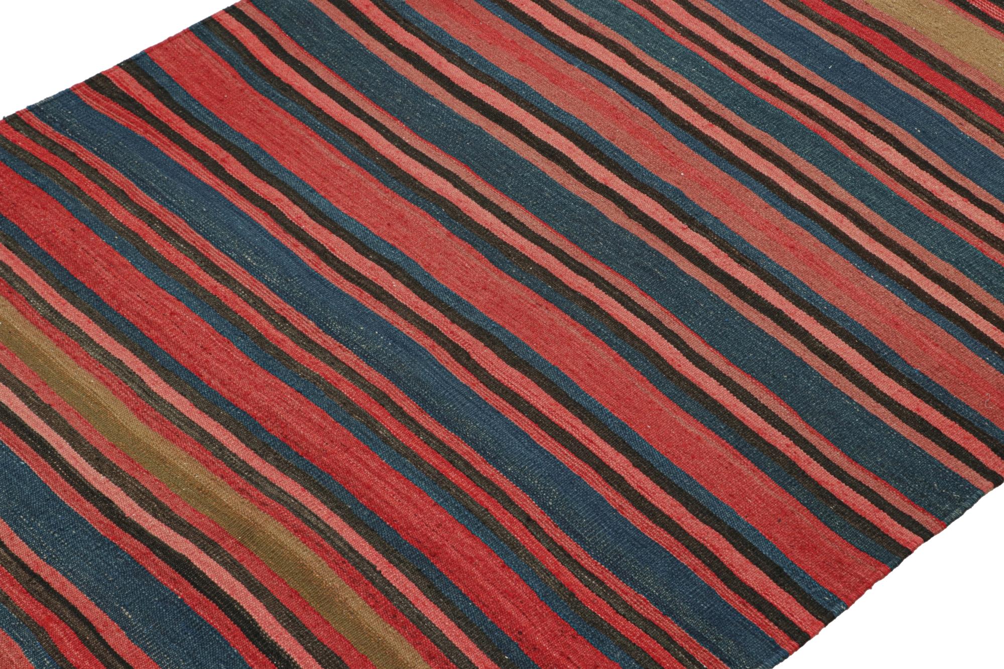 Handwoven in wool circa 1950-1960, this 5x9 vintage Persian Kilim is believed to be a tribal rug of Bidjar provenance—a new unveiling from the Rug & Kilim collection. 

On the Design: 

This flatweave enjoys a repeat of stripes in its all over