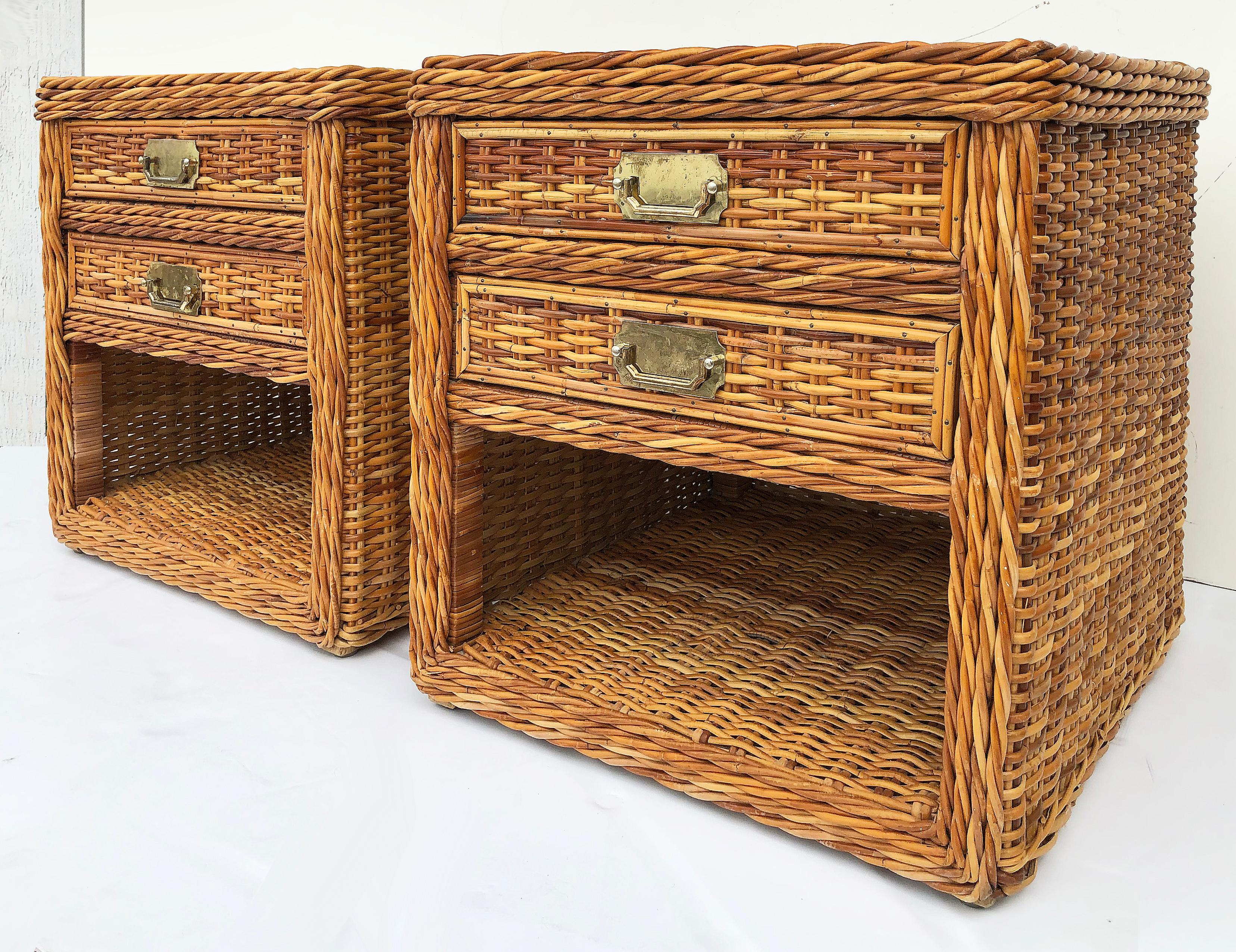 Vintage Bielecky Brothers woven rattan night stands, pair

Offered is a pair of Coastal style woven rattan night stands with brass handles. Each piece has two drawers above with open storage below. The nightstands are from the Bielecky Brothers of