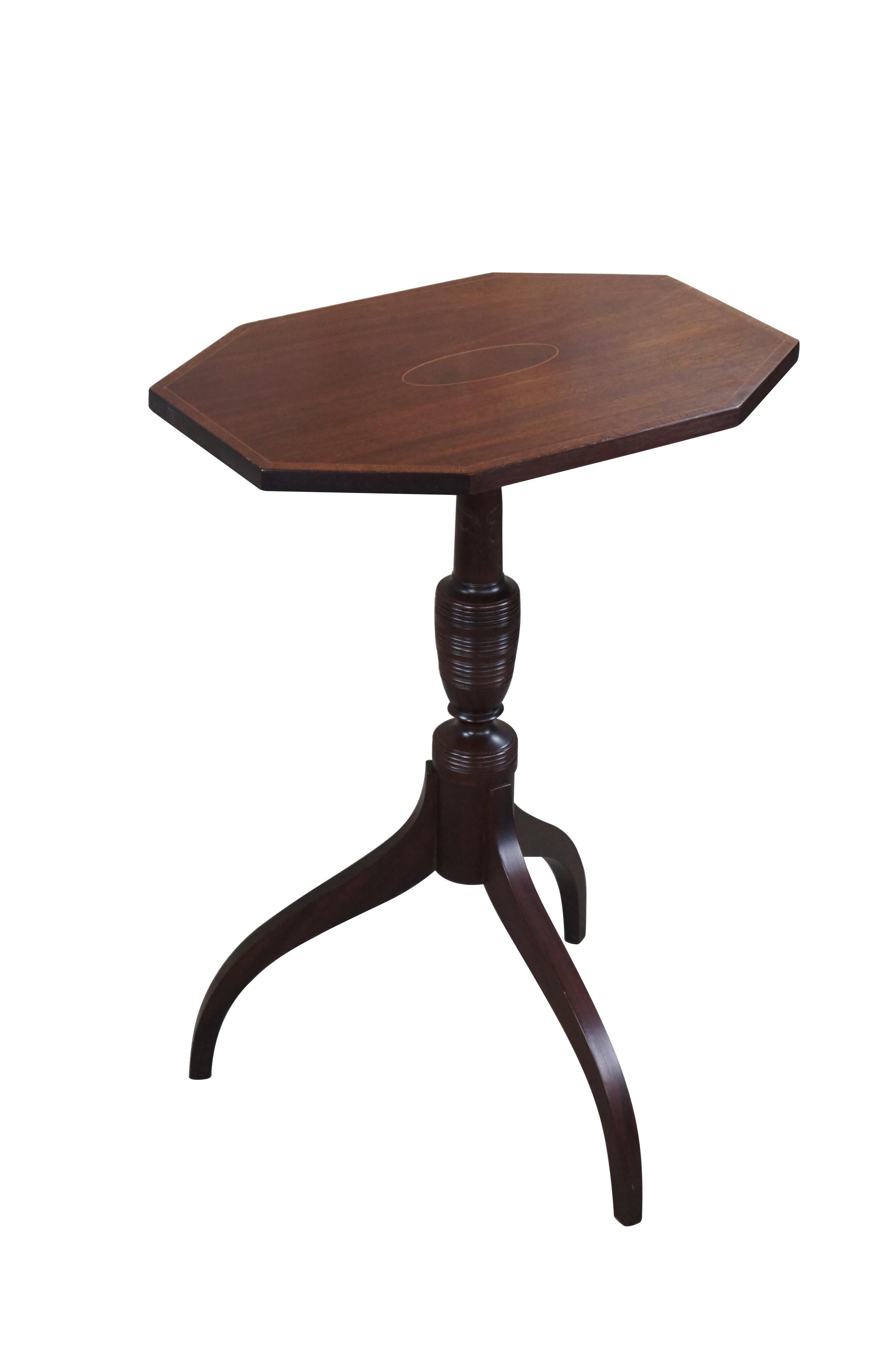 Biggs Furniture Old Sturbridge Village Collection Federal Candle or Sculpture Stand, circa last half 20th century. Made from mahogany with an Octagonal inlaid and crossbanded top over turned and ribbed center support leading to spider leg base.