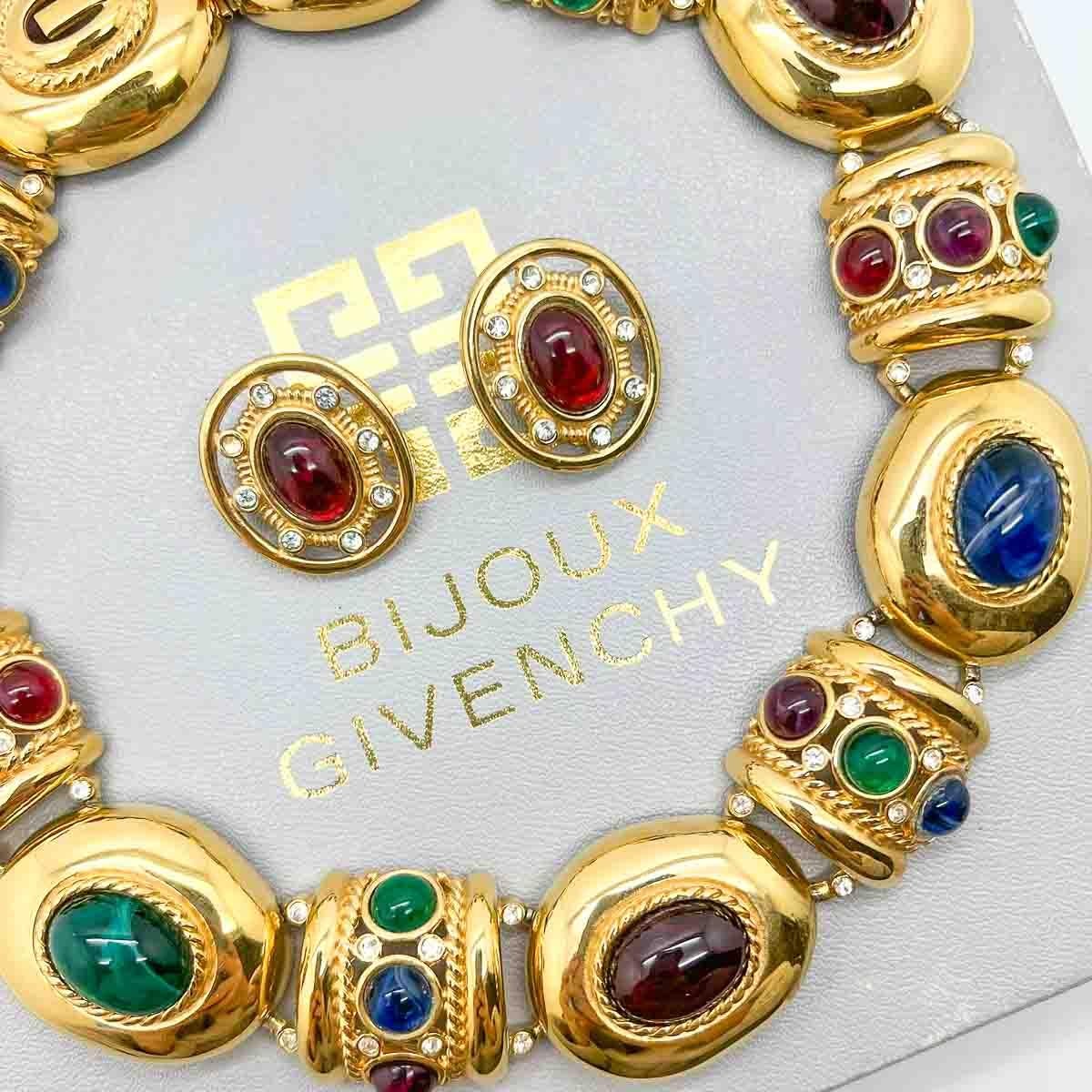 A spectacular and rare Vintage Givenchy Byzantine Collar and earrings with original satin lined Bijoux Givenchy box. Crafted in lustrous gold-plated metal this statement collar and earrings is remarkable and breath-taking in it's detail and design.