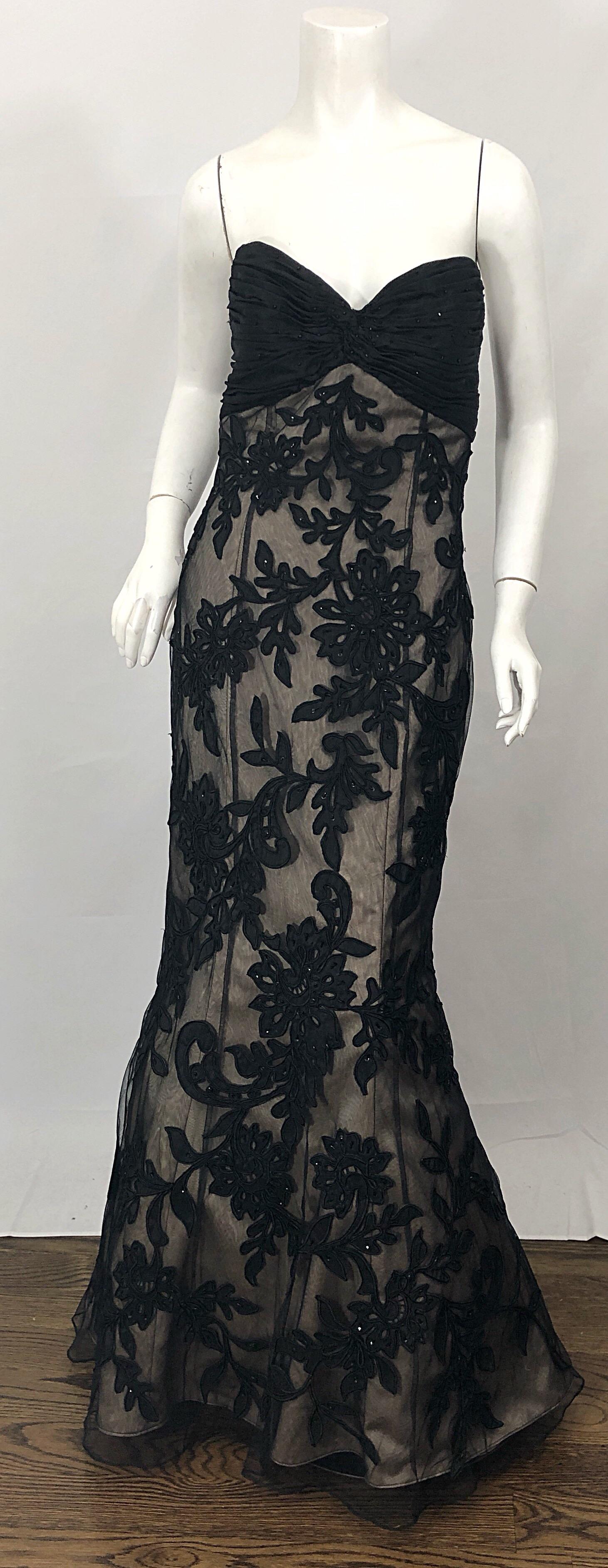 Sensational vintage BILL BLASS for SAKS 5th AVENUE black and nude silk beaded strapless mermaid gown! Features a bones ruched silk taffeta bodice. Black sheer embroidered and beaded silk lace overlay with nude silk underneath. Timeless flattering
