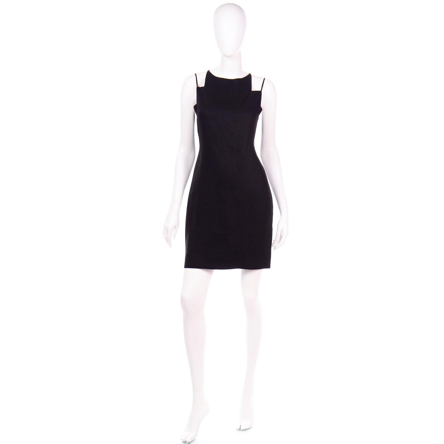 Vintage Bill Blass pieces are truly remarkable and we always grab them whenever we can! This amazing Bill Blass vintage black linen evening mini dress has a dramatic cutout design at the neck and shoulders that makes it so unique! We also love the