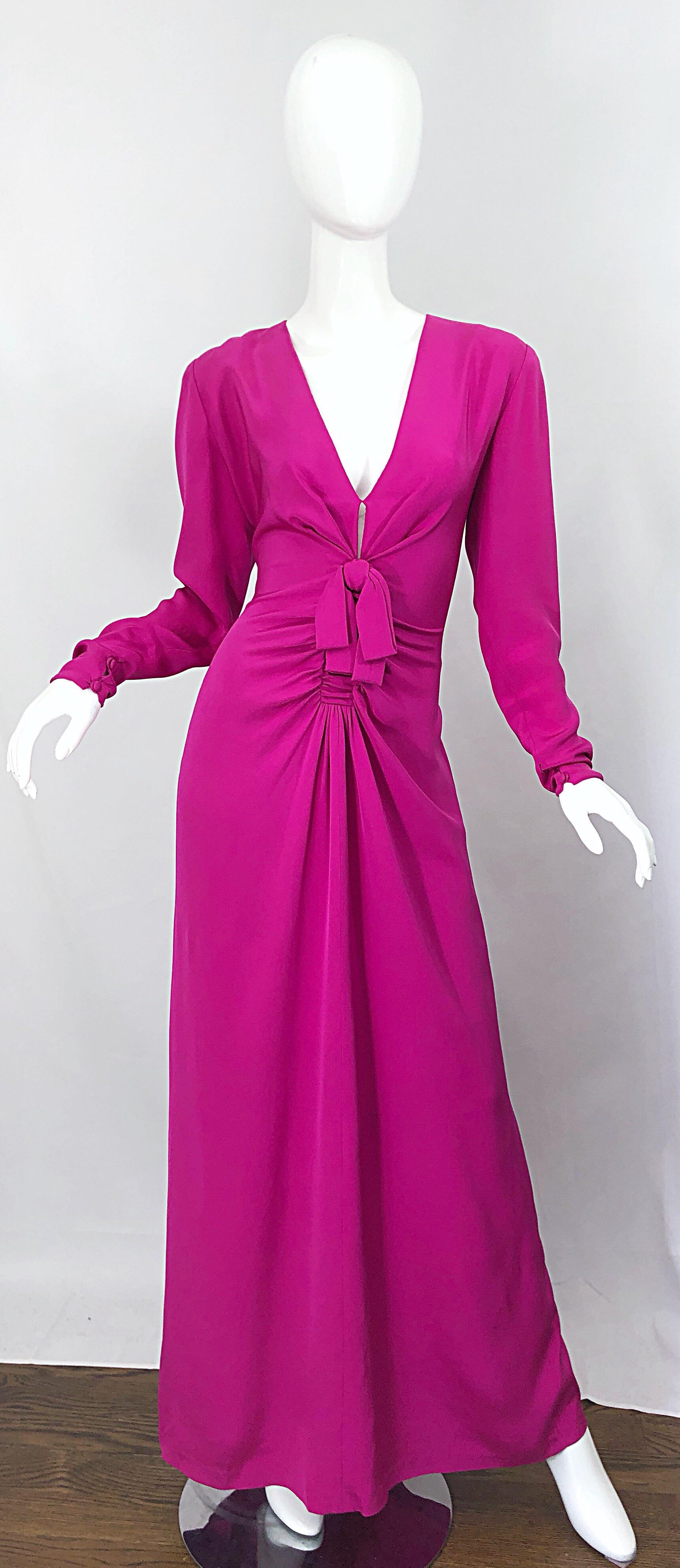 Stunning vintage BILL BLASS for NEIMAN MARCUS Couture quality hot pink / magenta fuchsia long sleeve silk jersey cut-out evening gown! Features a fitted bodice with flattering ruched detail at the waist. Cut-out at center bust reveals just the