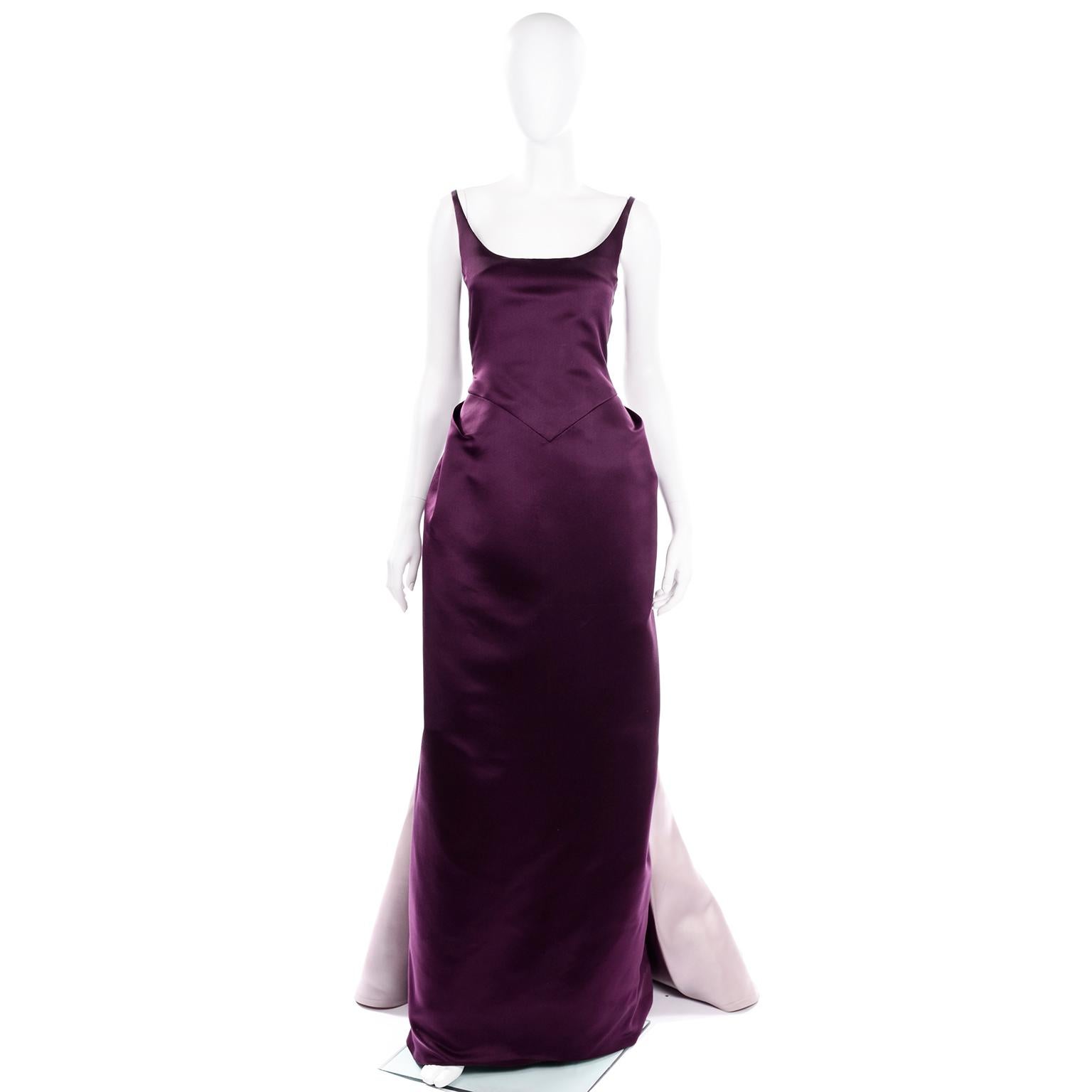 This vintage Bill Blass evening dress is so unique and a total showstopper! This deep purple satin dress has a thick tightly woven tulle under layer to add more fullness and structure to the skirt portion. The dress has a center panel on the back