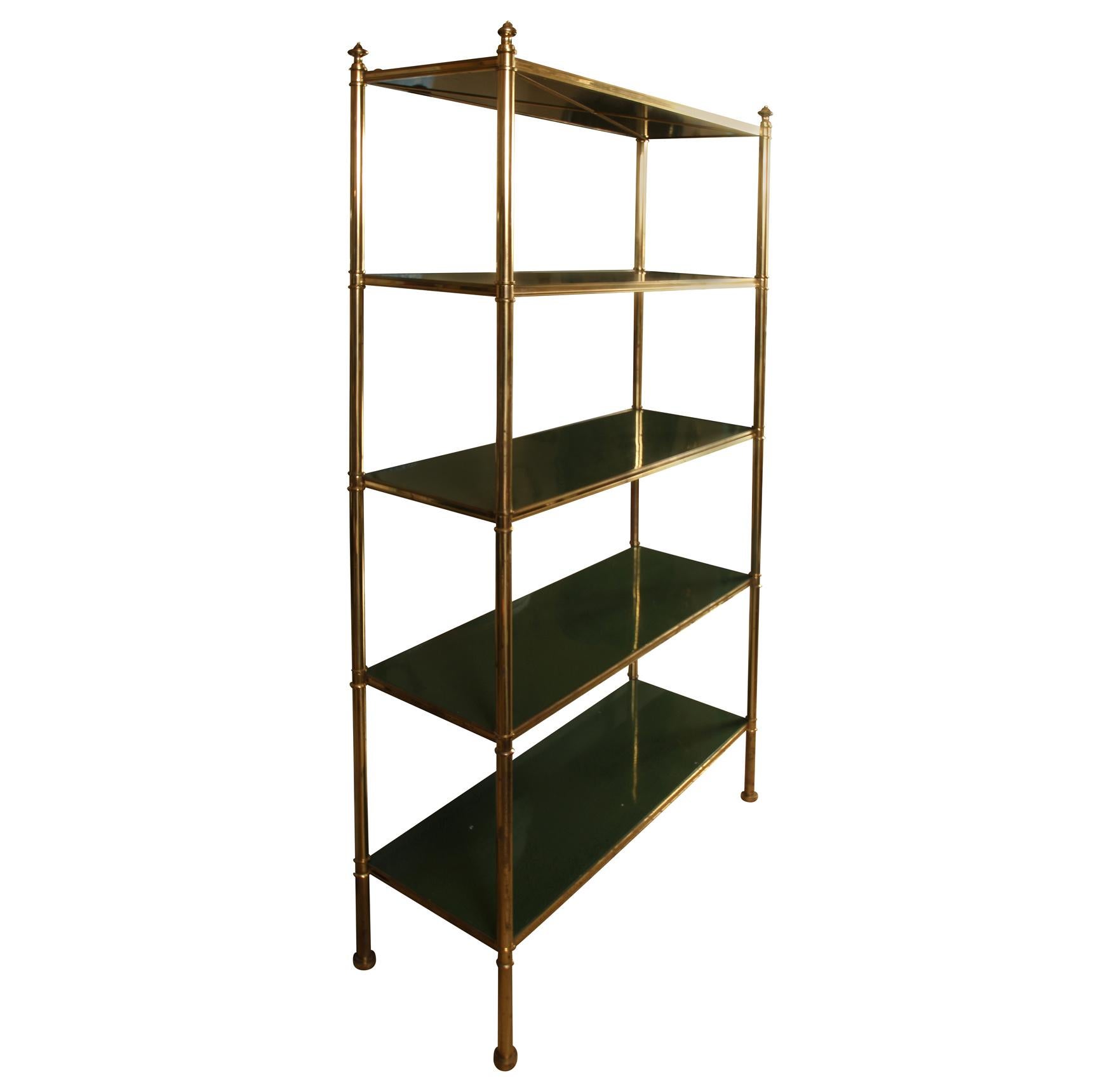 A vintage brass Billy Baldwin etagere with five dark green lacquered shelves.
