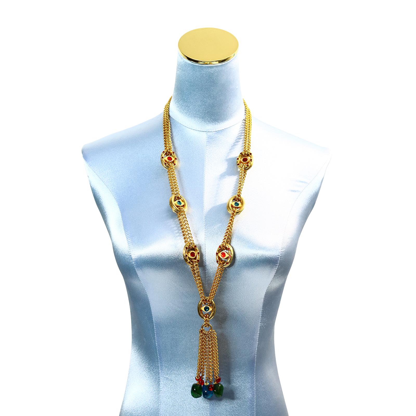 Vintage Billy Boy Gold Tone Evil Eye Long Necklace Sautoir.  Double Strands of Gold Chain and Double Pieces of  Evil Eye that are Enameled with Red, Green and White.  They are then joined together at the bottom with dangling strands of Gold Chain