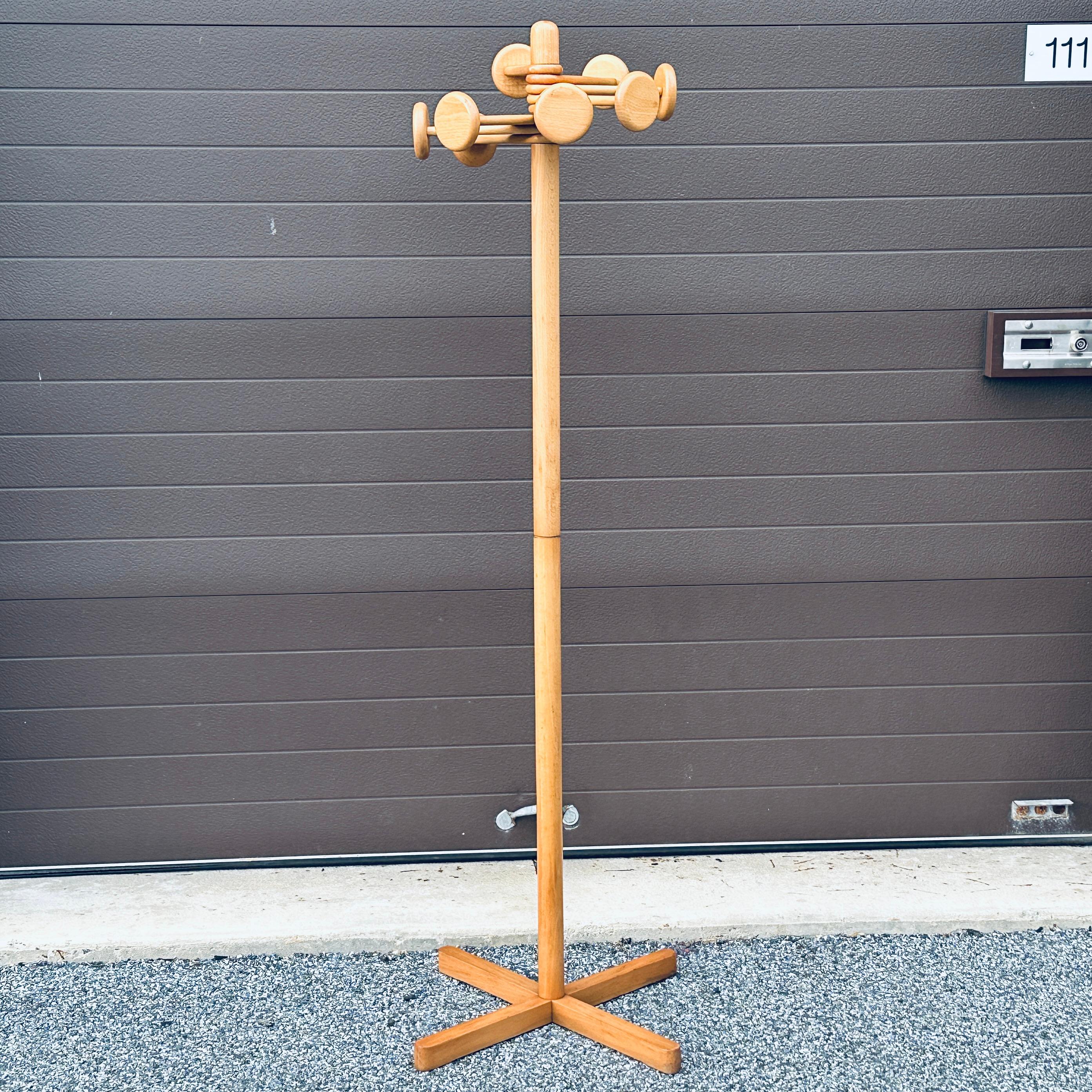 Vintage modernist standing coatrack crafted from solid birch wood. Circa late 20th Century and unsigned. 