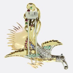 Vintage Bird Of Paradise Diamond Ruby Sapphire and Emerald Brooch