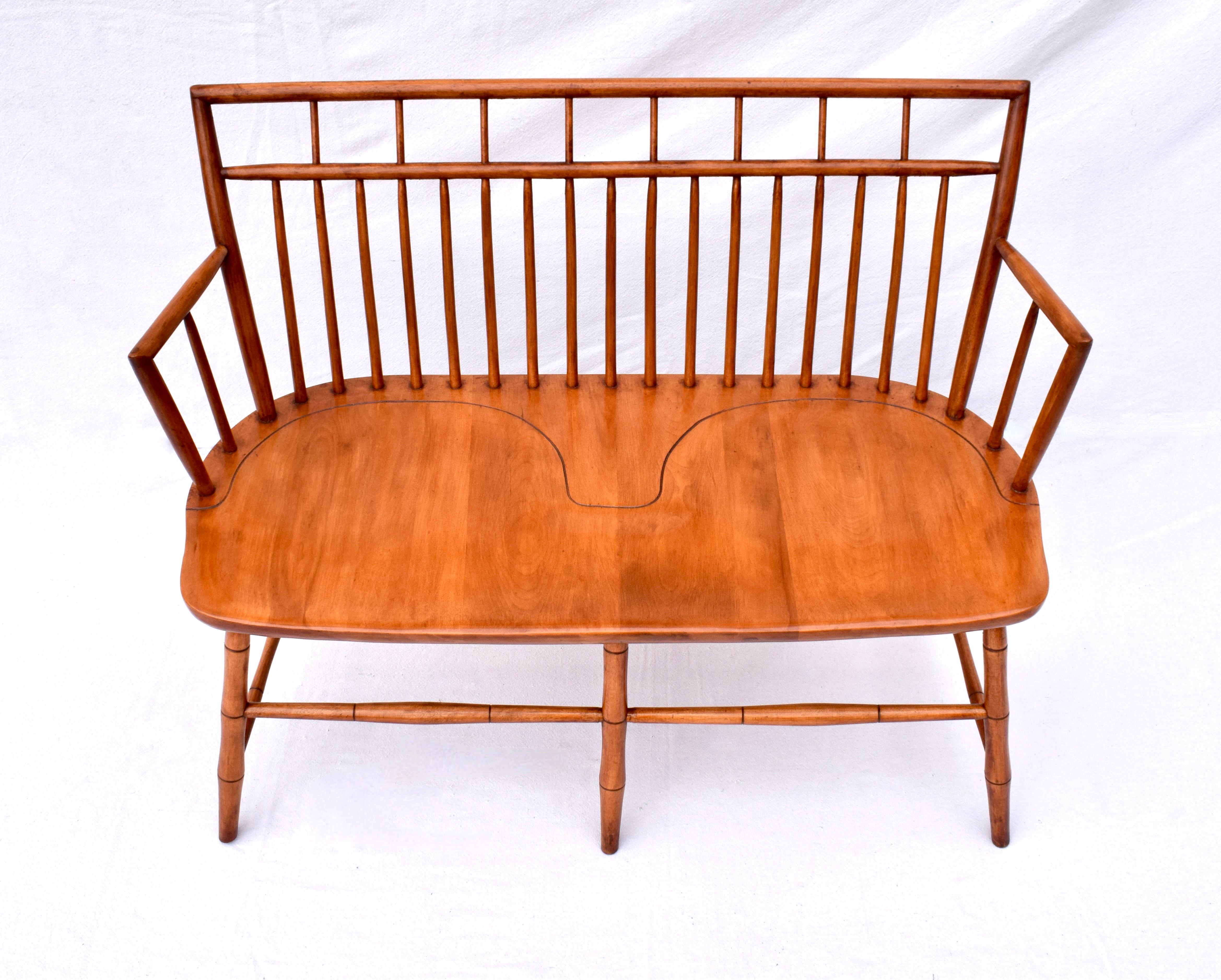1970's bamboo turned American windsor bench of mortis & tenon joinery in the birdcage style; newly refinished.  Additional dimensions: seat: 17.25