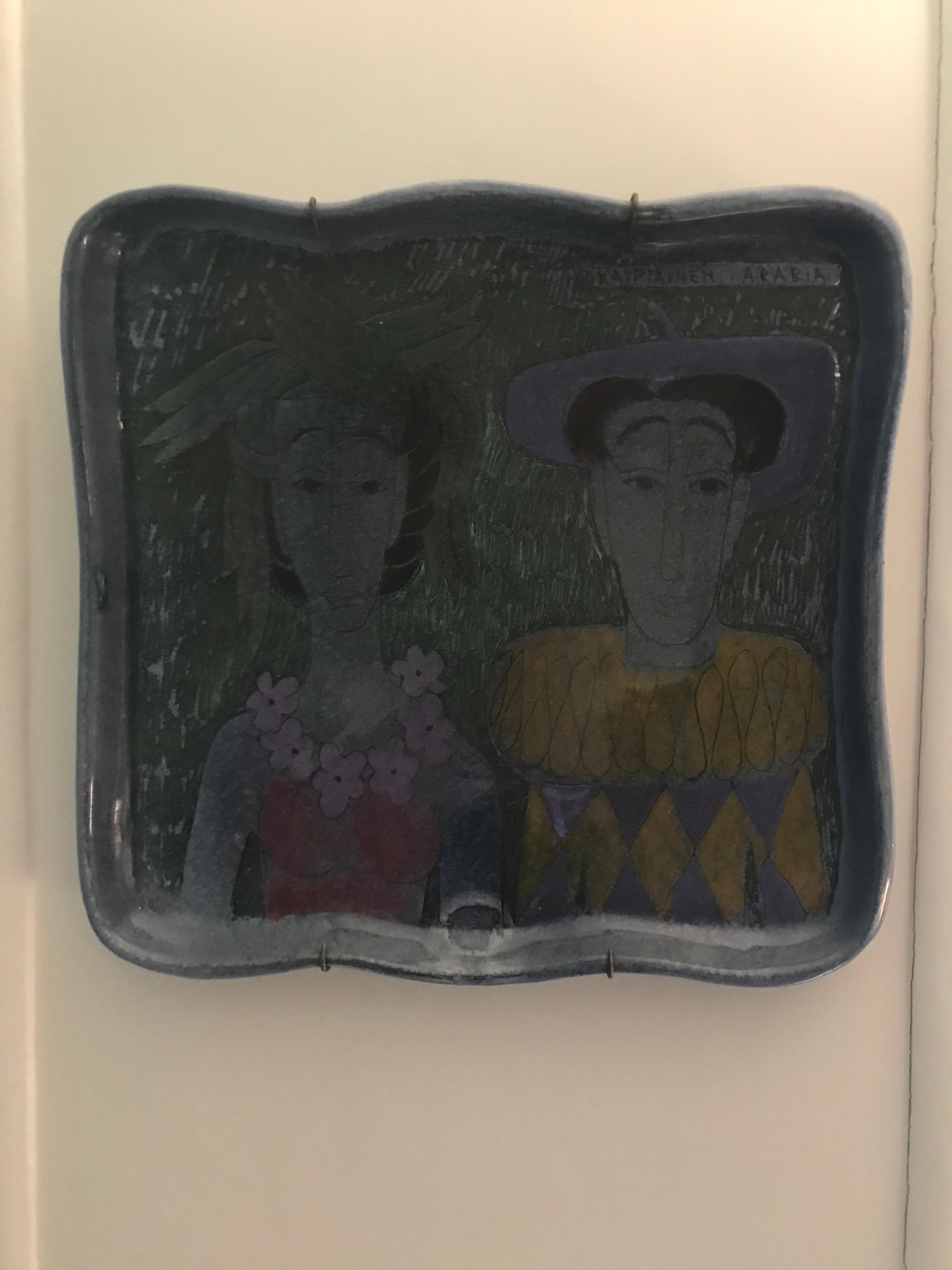 Amazing Birger Kaipiainen ceramic hanging platter with decoration on pink fund.

Birger Johannes Kaipiainen (1915-1988) graduated from the Central School of Arts & Crafts of Helsinki and worked for Finnish ceramics company Arabia for more than