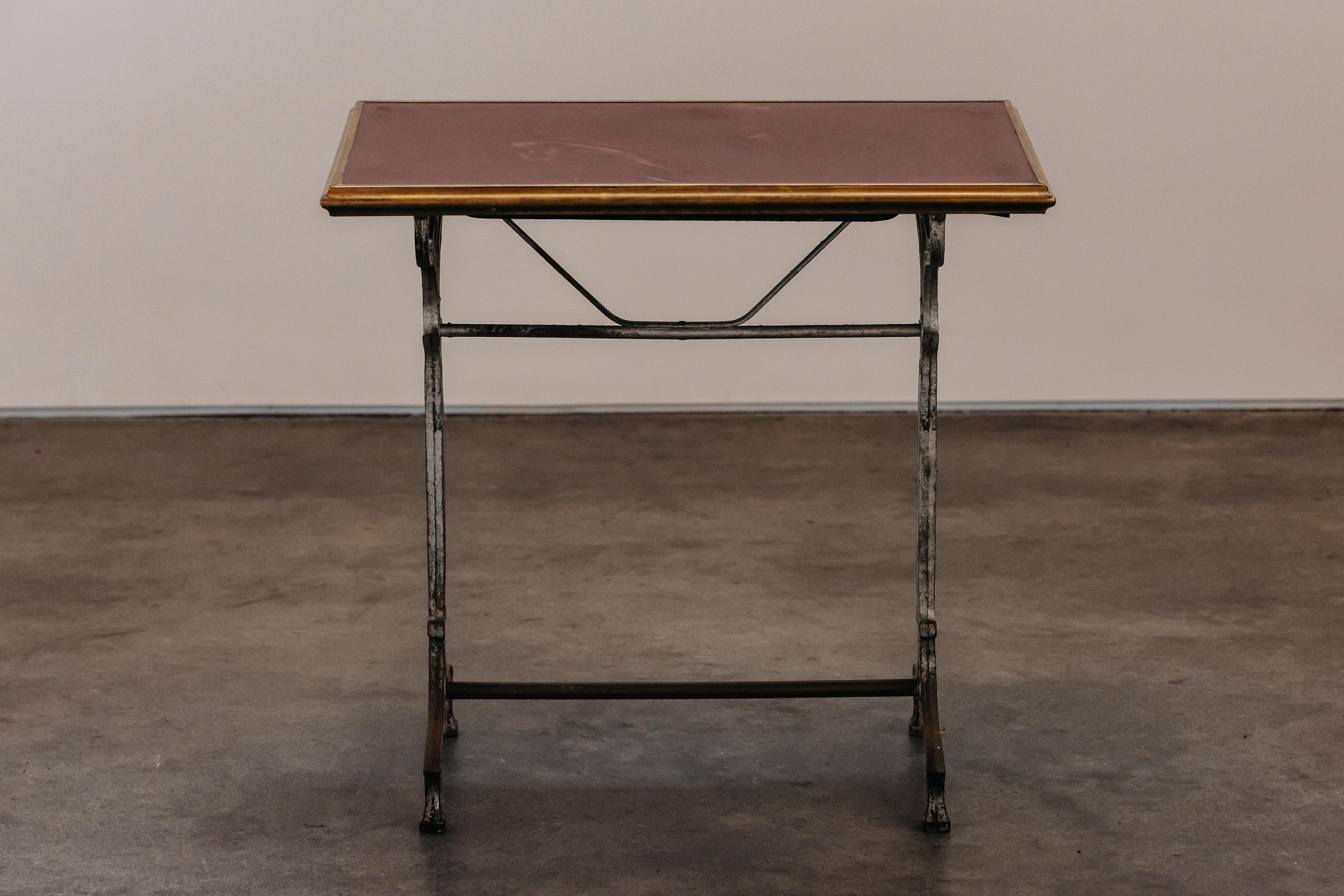 Vintage Bistro Table From France, Circa 1950.  Unusual model with great patina and use.

