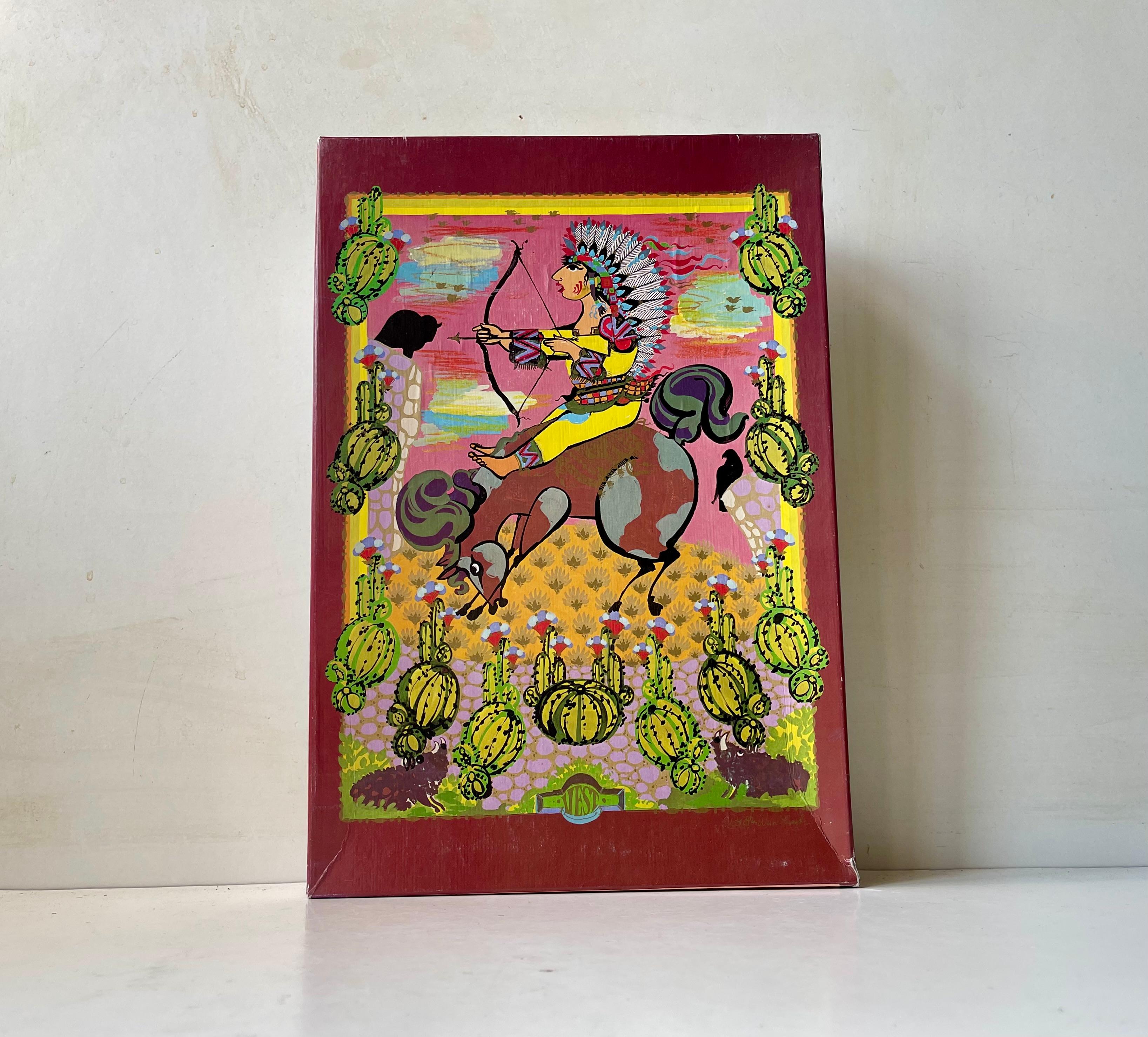 Un puzzle rare de 500 pièces en papier cartonné de 3 mm d'épaisseur. Motif : Indien d'Amérique. Conçue dans les années 1970 et fabriquée pour Irma au Danemark en 1979. Dimensions de la boîte : 33x23x3 cm.