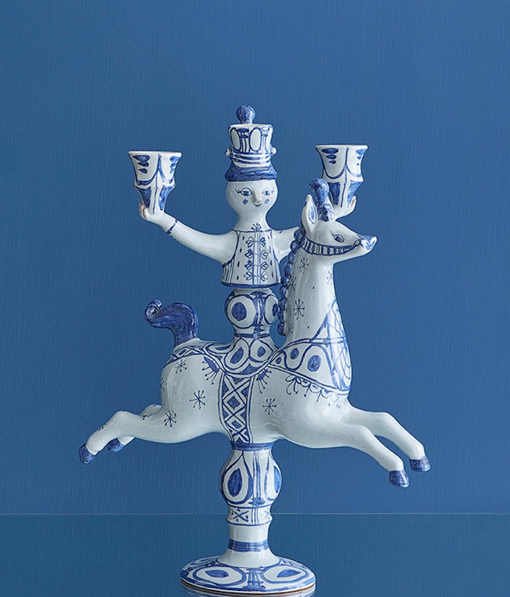 Bjørn Wiinblad
Denmark, 1974

Candlestick in painted ceramic in the shape of a horserider.

About 
Danish ceramist and painter Bjørn Wiinblad (1918-2006) graduated from The Royal Danish Academy of Fine Arts in 1943. His artistic oeuvre