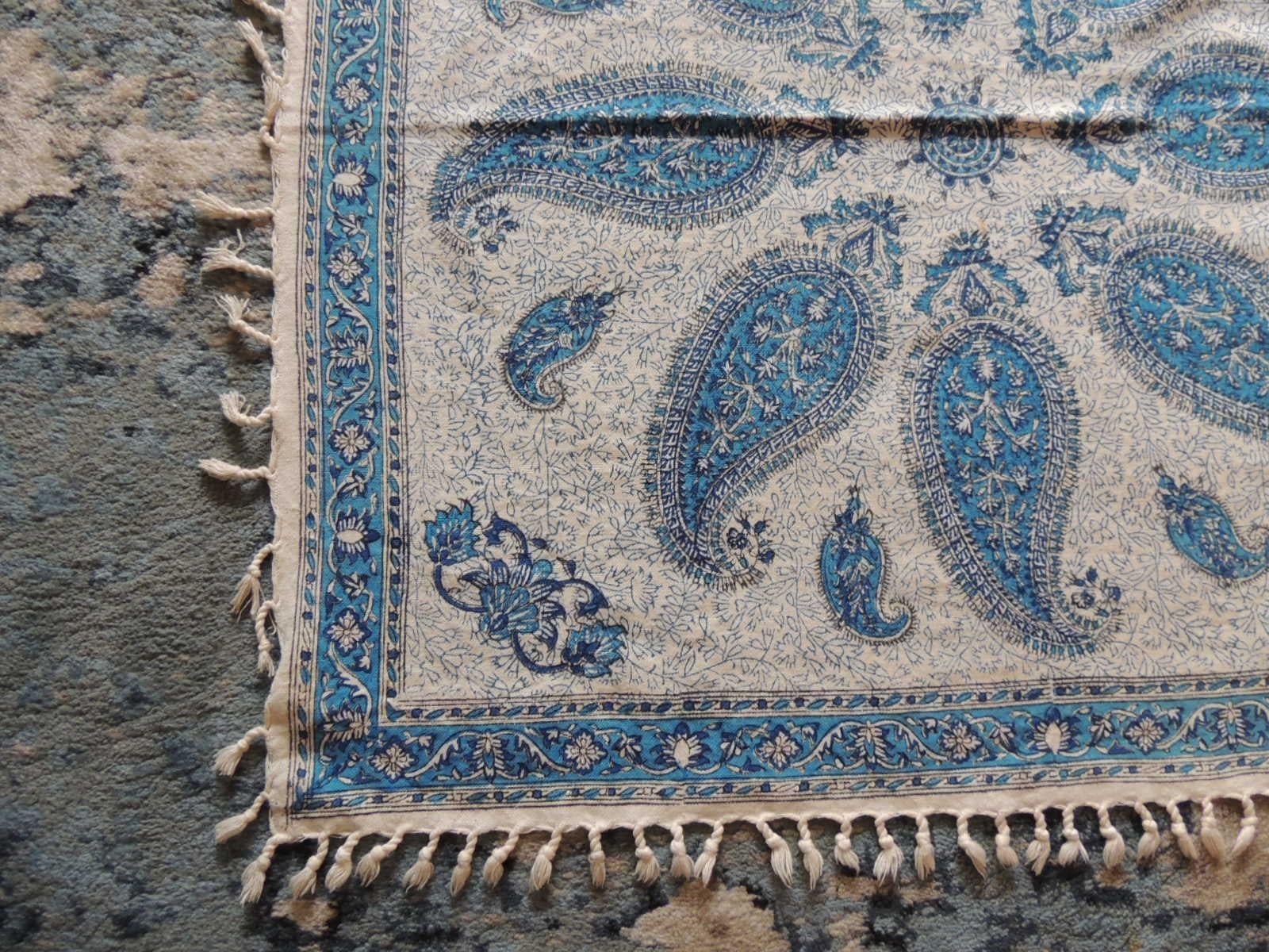 Vintage red and blue paisley hand-blocked cloth with hand-knotted fringes
Kalamkari or qalamkari is a type of hand painted or block-printed cotton textile.
Size: 30