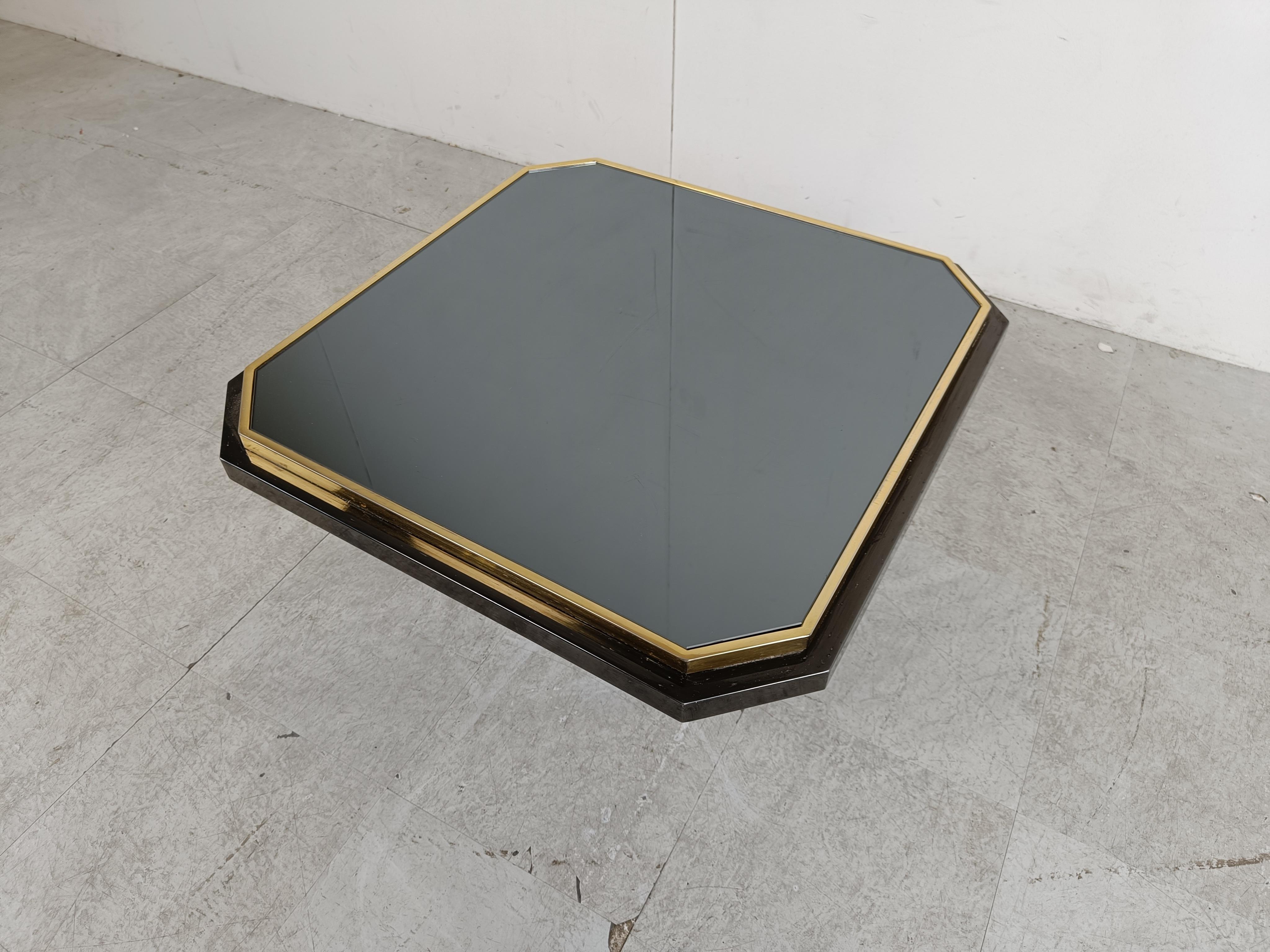 Quality 24kt gold layered and black metal coffee table with a smoked glass top.

The table was manufactured by Belgochrom and produced quality furniture pieces with a luxurious appeal.

The table has had one previous owner and was maintained very
