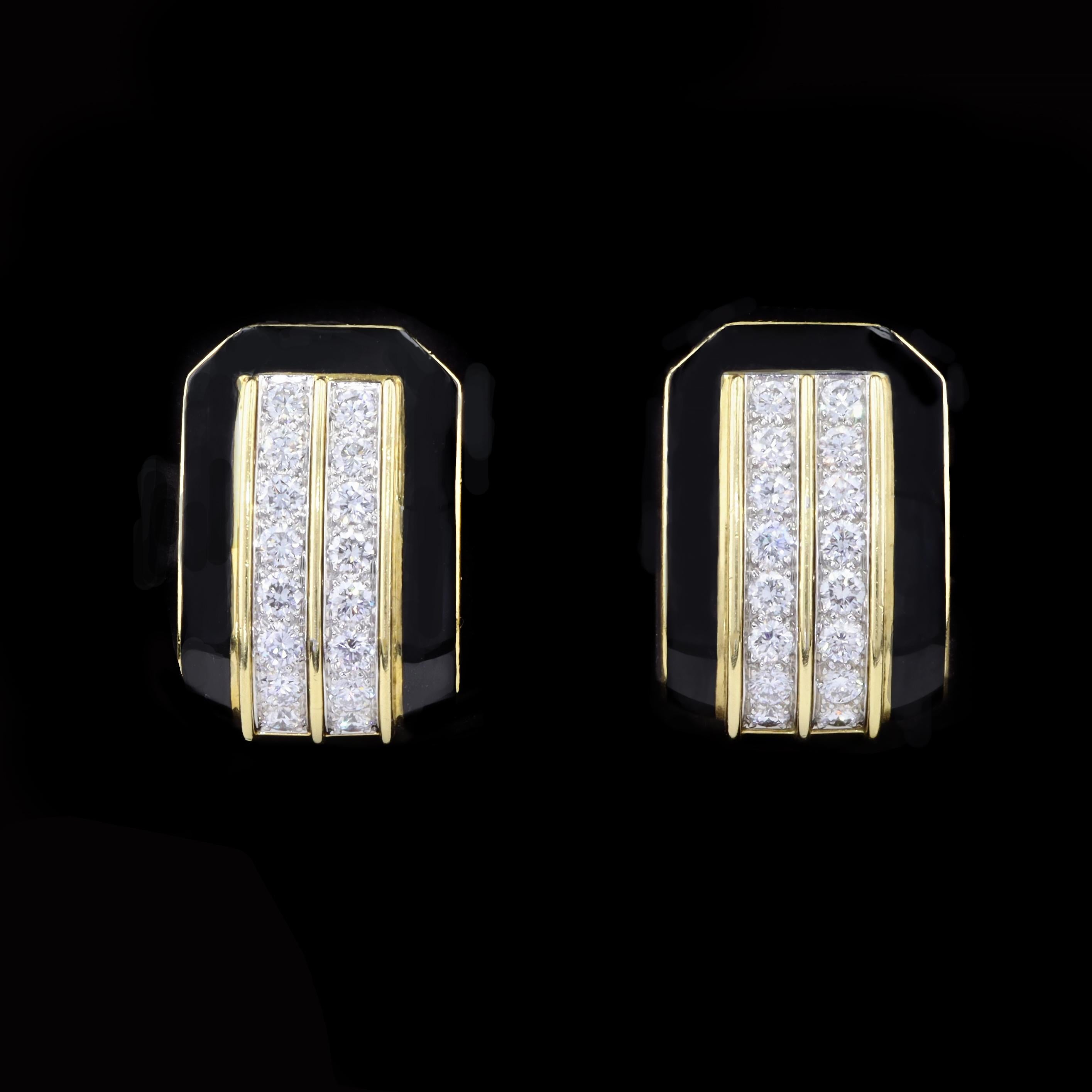 Score a fabulous fashion touchdown with these vintage circa 1970’s 18K yellow gold diamond earrings. Black enamel provides a striking contrast to yellow gold in these earclip earrings that feature 32 sparkling round cut diamonds weighing