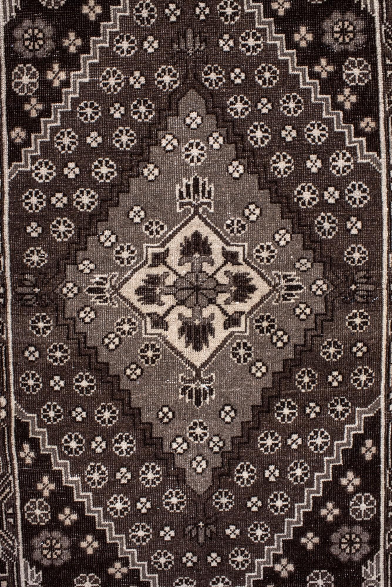 Hand-Knotted Vintage Black and Ivory Khotan Rug with Medallion and Floral Motif For Sale