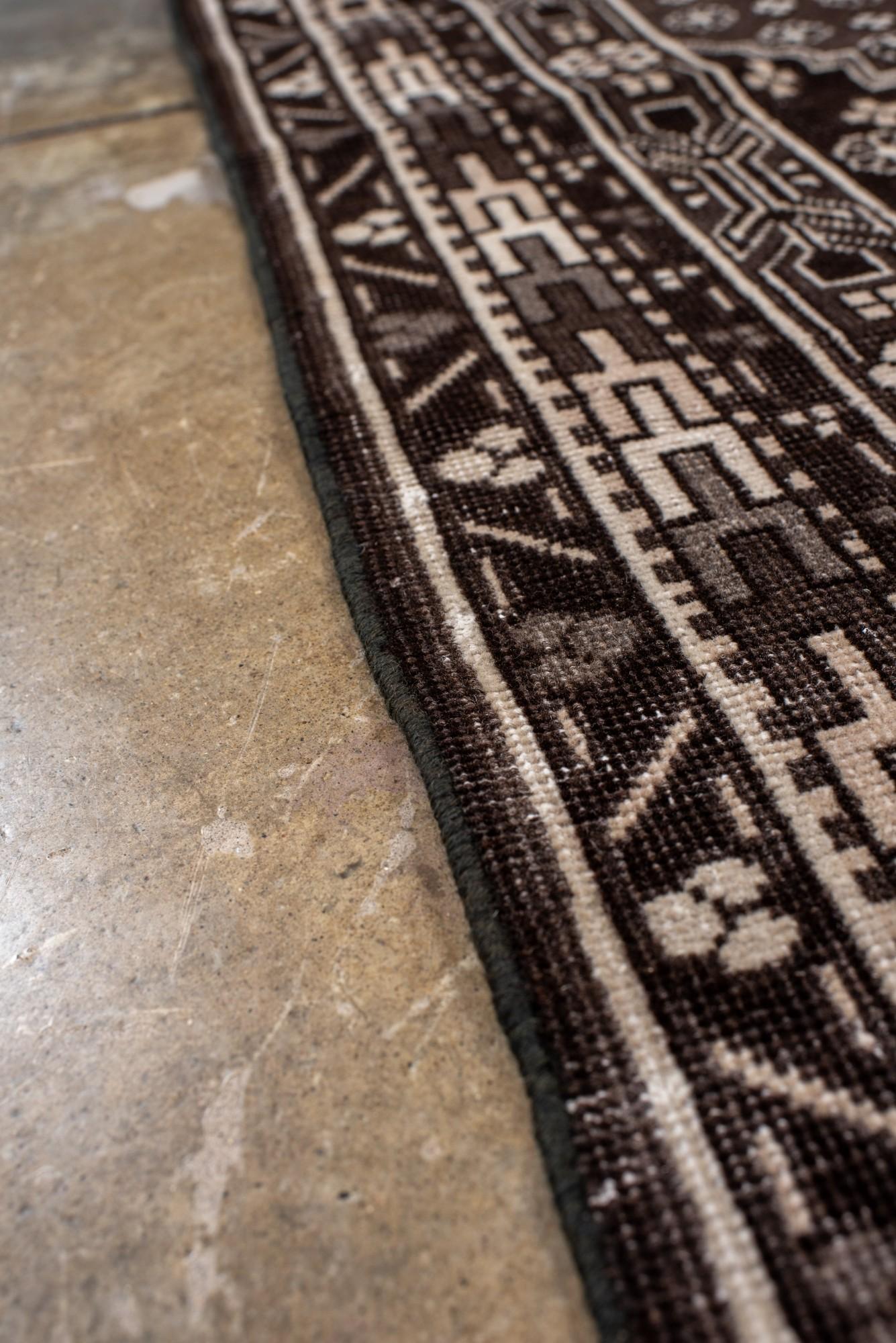 Wool Vintage Black and Ivory Khotan Rug with Medallion and Floral Motif For Sale