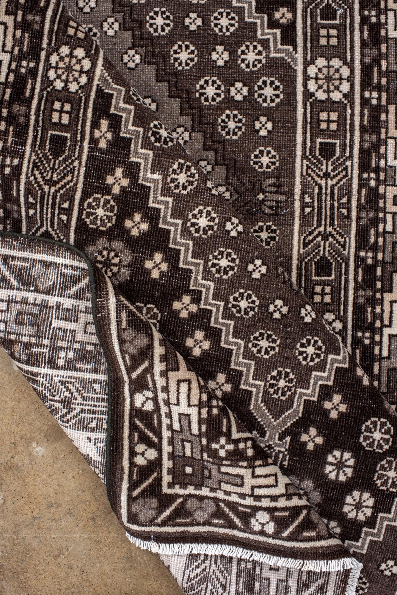 Vintage Black and Ivory Khotan Rug with Medallion and Floral Motif For Sale 1