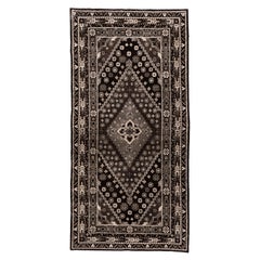 Vintage Black and Ivory Khotan Rug with Medallion and Floral Motif