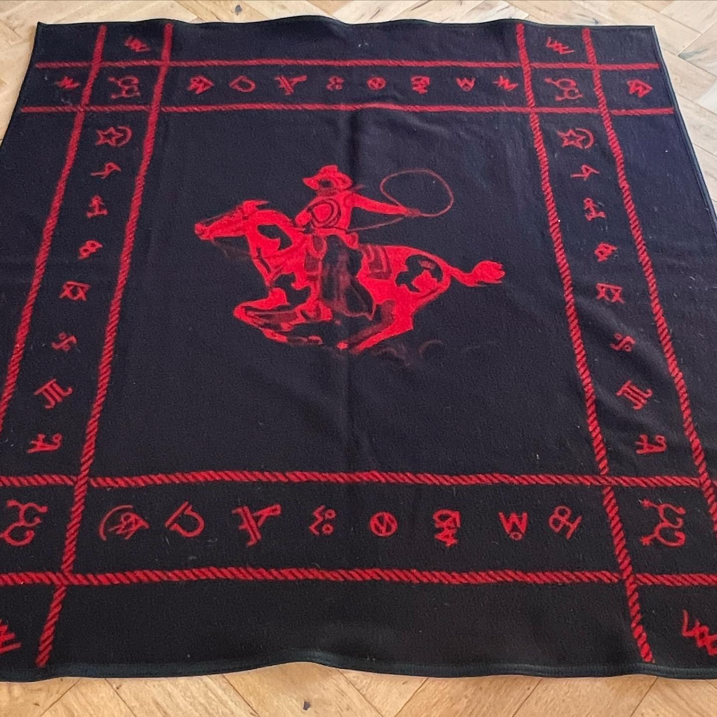 REVERSE COWBOY: a reversible black and red cowboy throw by Westland of Pendleton, made in Oregon late 1950s. Fab condition with minor signs of age. Pick up in central west Los Angeles or we ship worldwide.
60” x 60” 