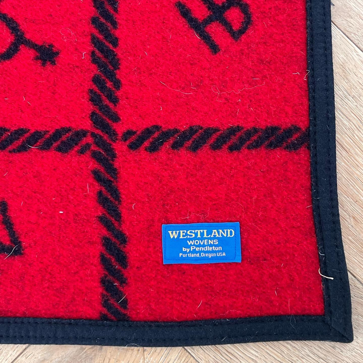 Wool Vintage black and red reversible cowboy throw by Westland of Pendleton, 1950s