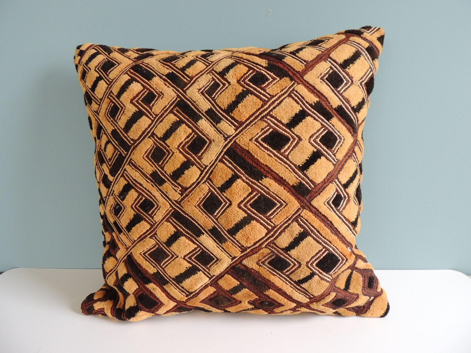 Vintage black and tan Raffia Velvet Kuba African square decorative Pillow with chenille cotton brown backing.
Decorative pillow handcrafted and designed in the USA.
Closure by stitch (no zipper closure) with custom-made feather/Down pillow
