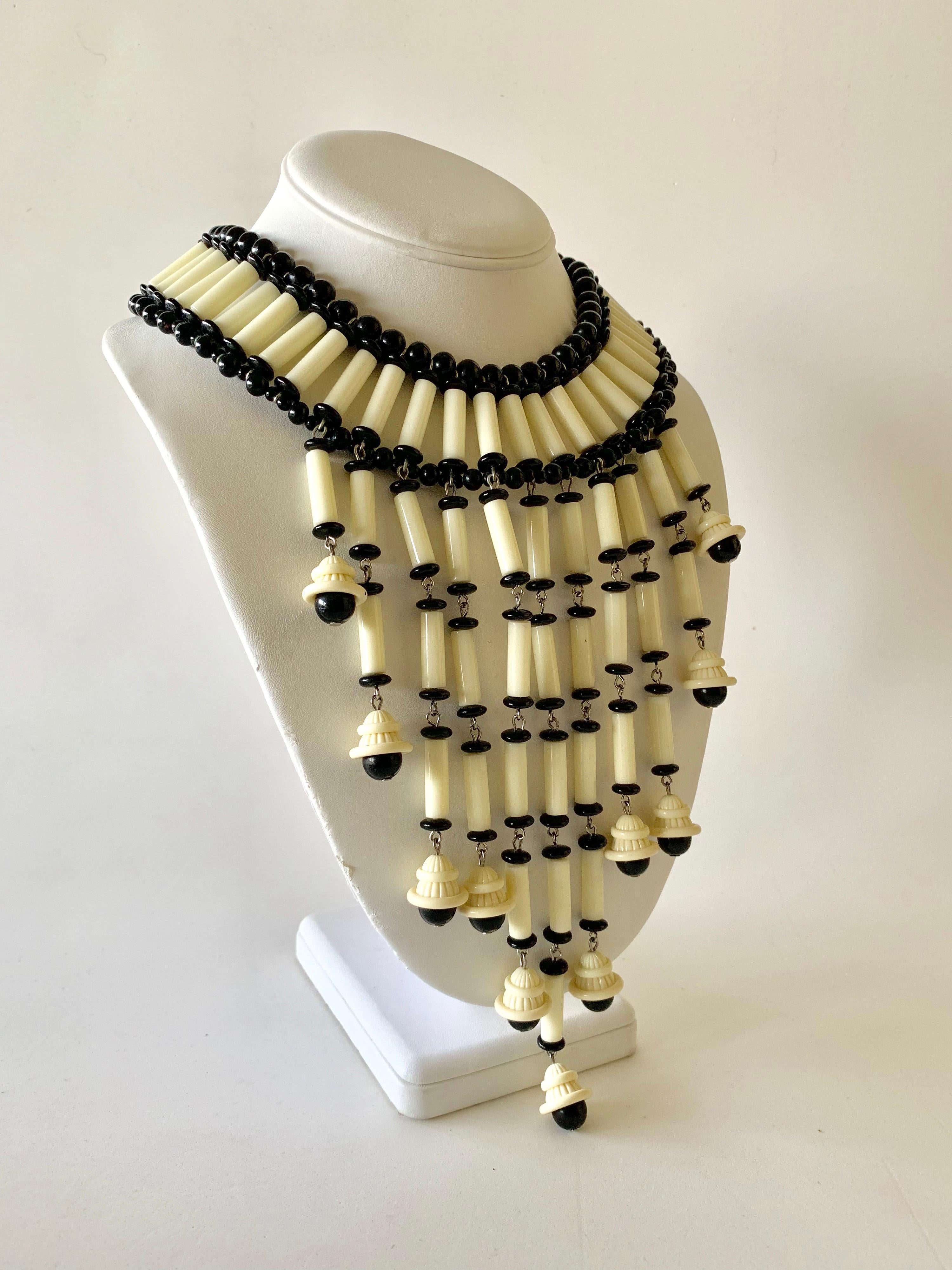 Monumental vintage one of a kindarchitectural black and white beaded fringe “bib” statement necklace - constructed out of black and white antique German glass and galalith beads c1971 in New York by Robert F. Clark and William de Lillo, a signed