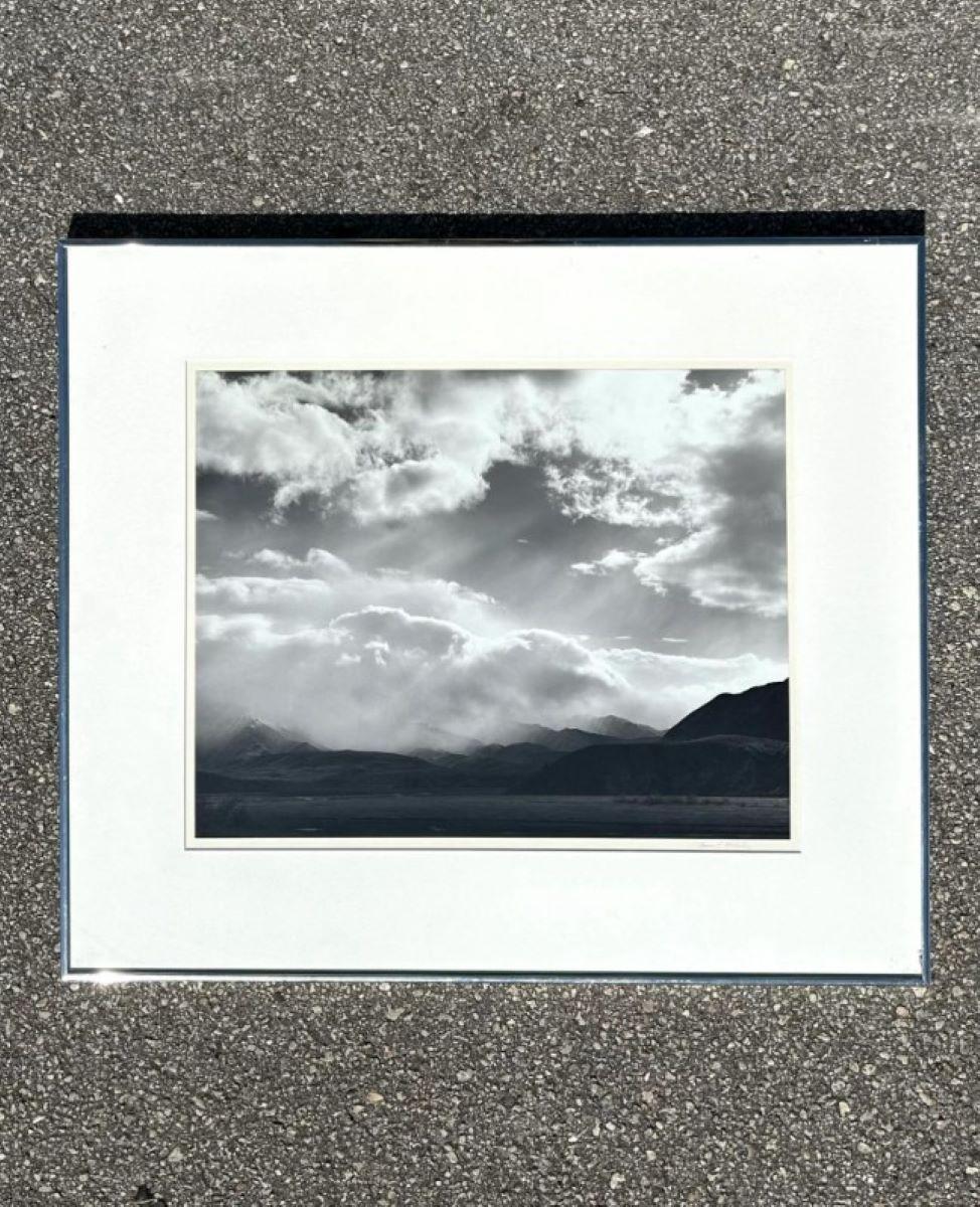 A vintage black-and-white photograph of a landscape has a timeless, classic appeal. The lack of color allows the viewer to focus on the composition, light, shadows, textures, and contrasts that often get overshadowed in color photography.
