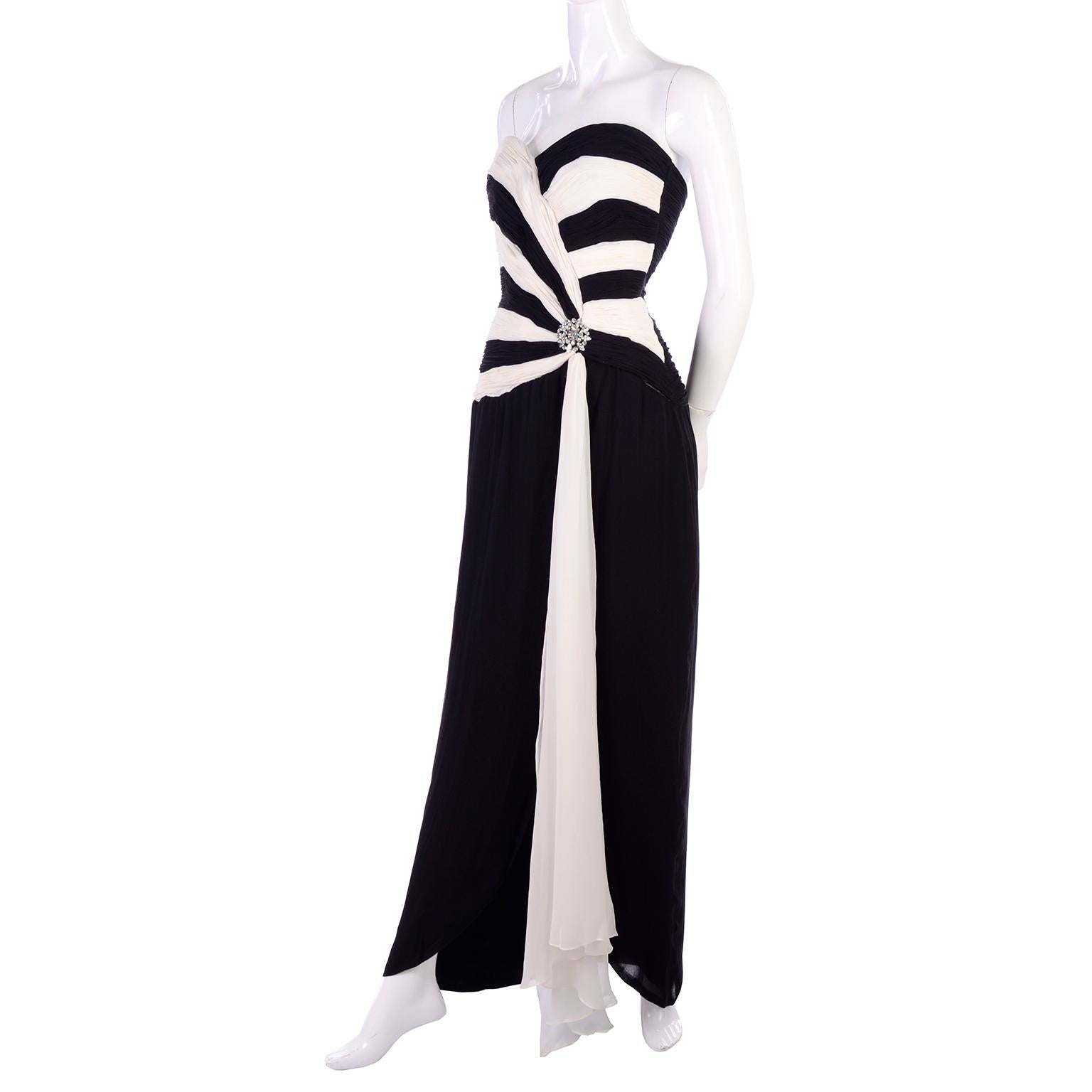 This is a stunningly elegant evening gown in black and white silk chiffon. The dress has 
