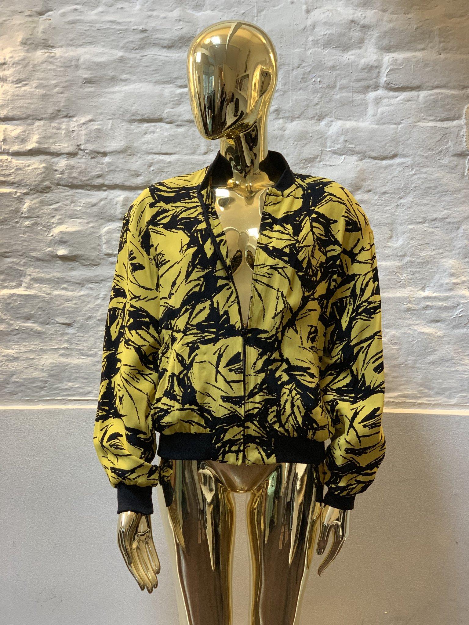 Vintage Black and Yellow Print Bomber Jacket made from viscose and crepe. 