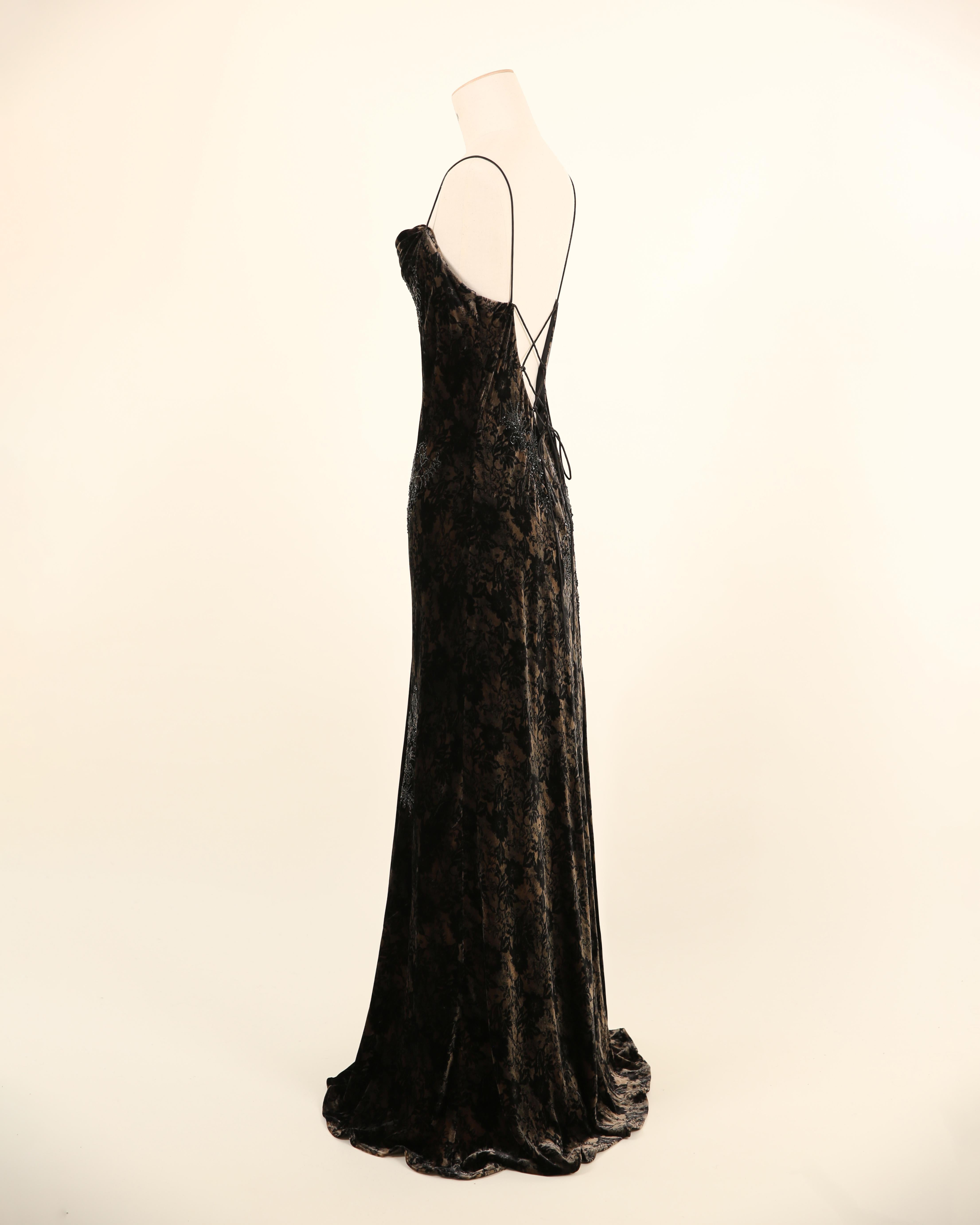 LOVE LALI VINTAGE

This is an absolutely beautiful vintage find, I would estimate from around the late 90's. A floor length floral velvet gown that cut on the bias it fits the body beautifully, skimming all the curves in just the right places. The