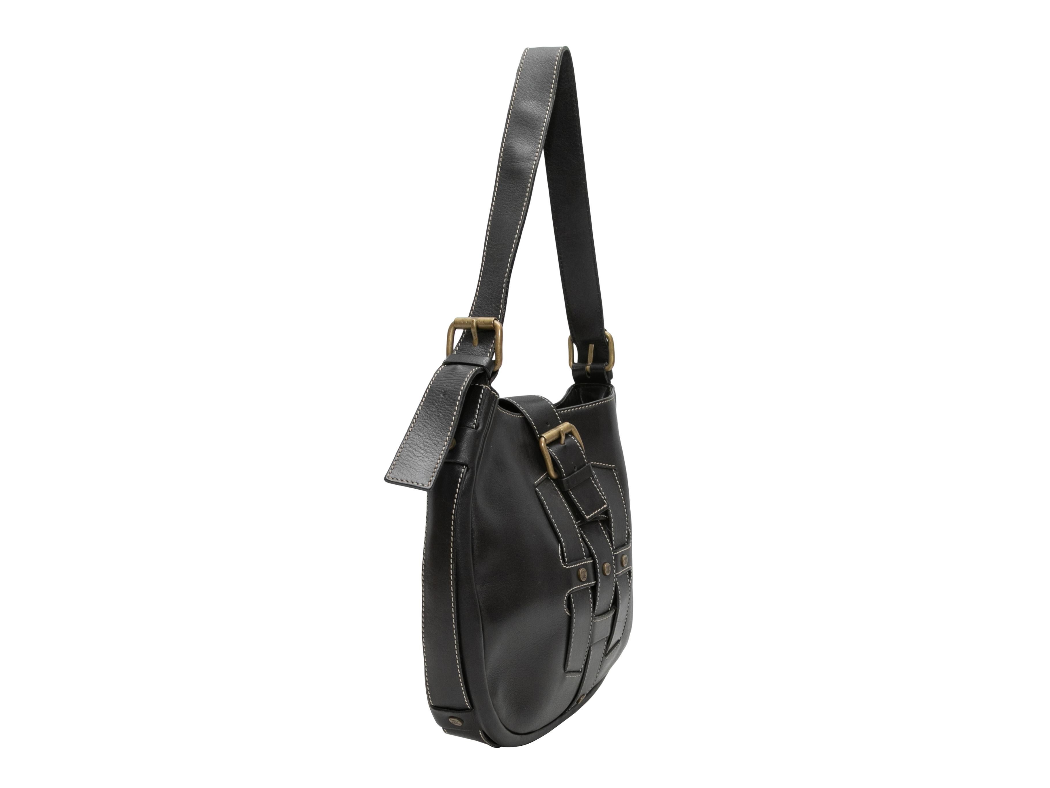 Product Details: Vintage Black Celine Leather Shoulder Bag. This shoulder bag features a leather body, gold-tone hardware, contrast stitching throughout, a single flat shoulder strap, and a top buckle closure. 12